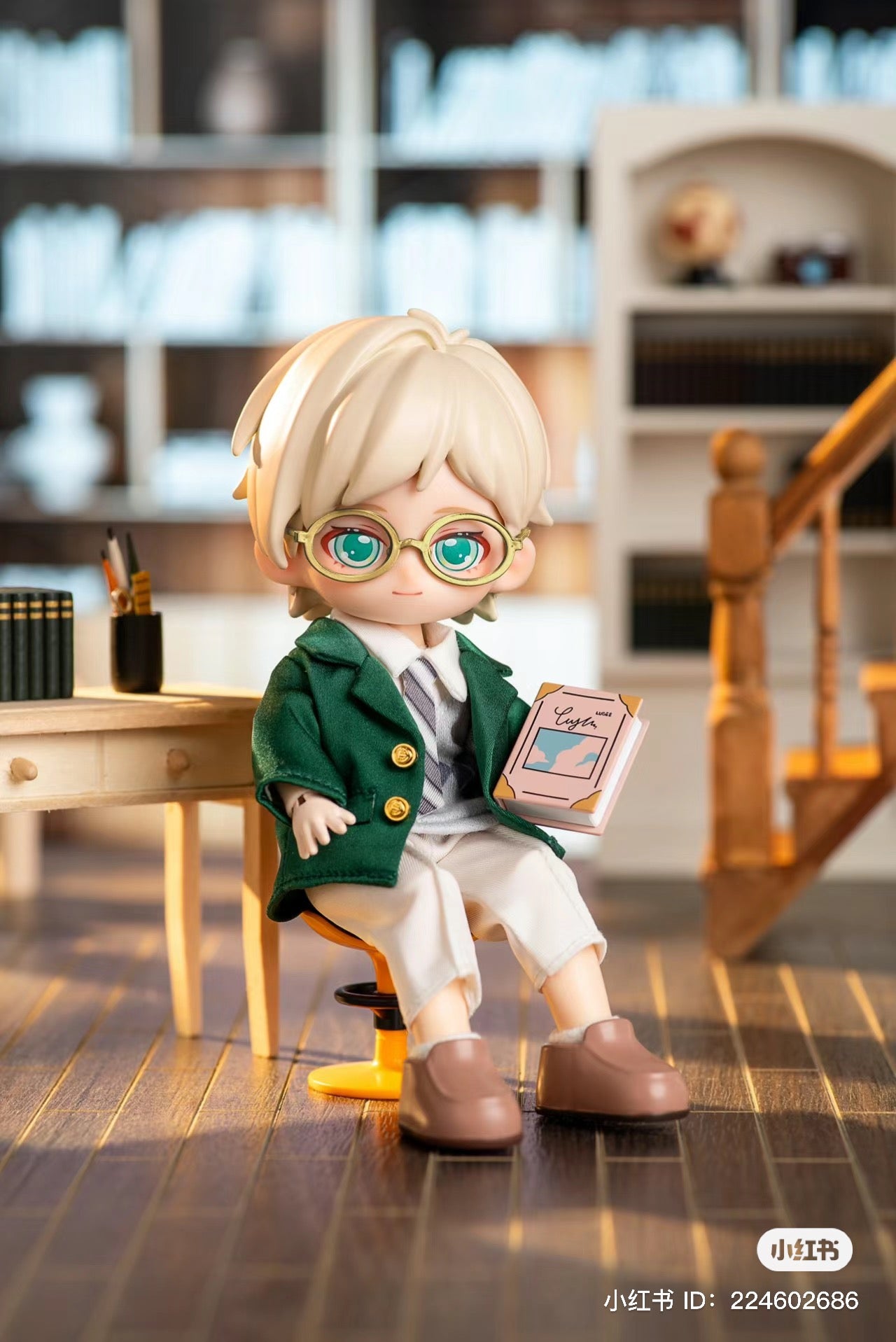 A toy figurine of a boy holding a book from PEETSOON School Life BJD Blind Box Series.