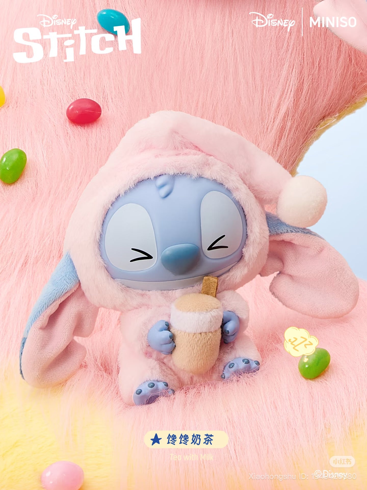 Stitch in a pink bunny onesie holds a plush tea with milk cup, promoting the Disney × MINISO Stitch Eat Something Before Sleep Plush Keychain Blind Box.