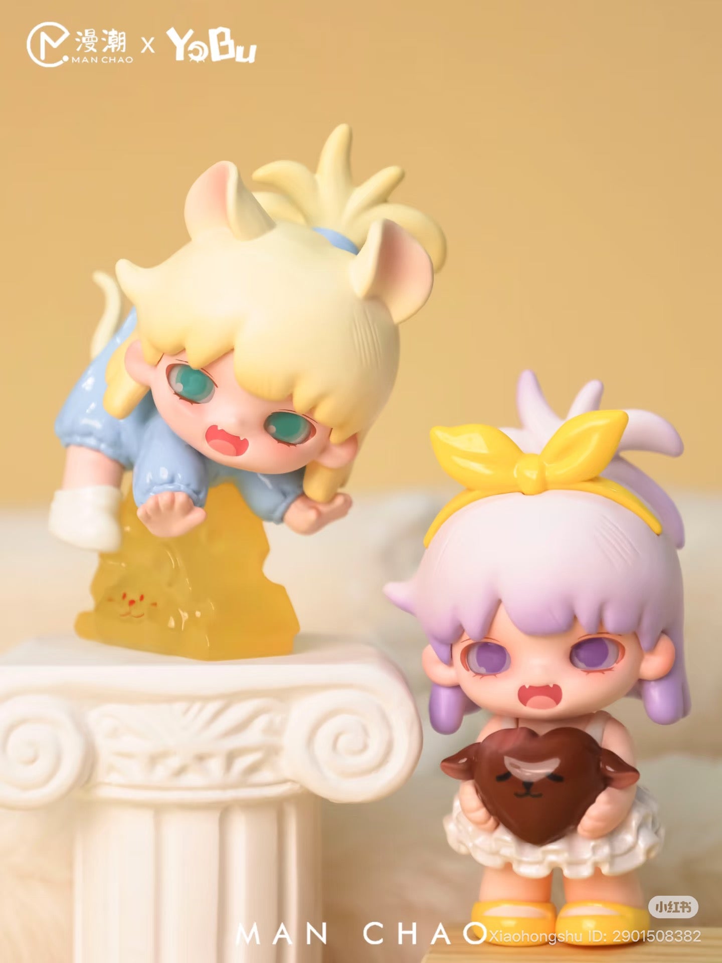 Two chibi vinyl figures from YOBU - It's A Bit Sweet Blind Box Series, featuring animal-inspired details by Man Chao x YoBu collaboration.