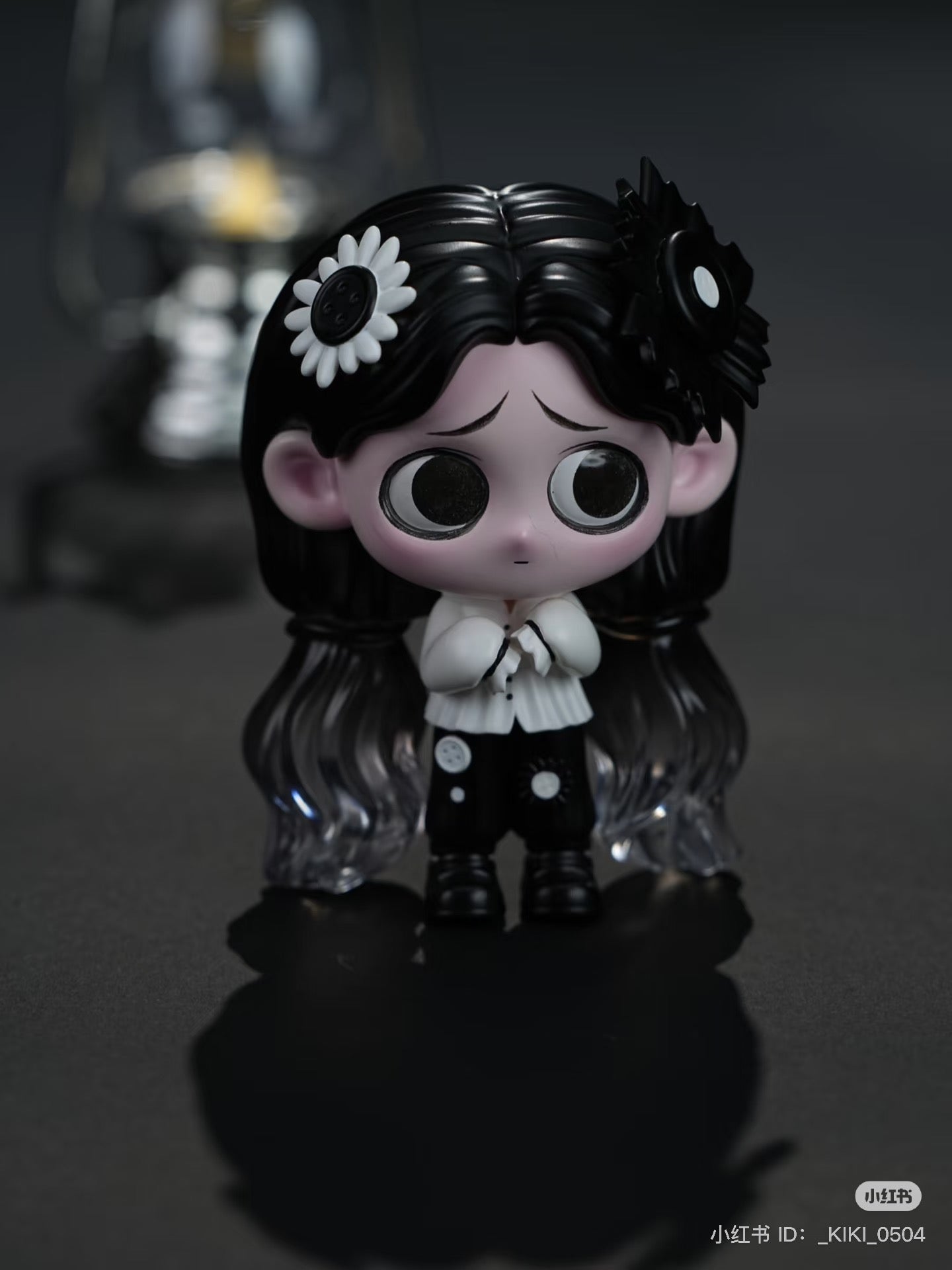 KiKi Button Girl figurine, featuring long hair and big eyes, made from resin/PVC, stands 11cm tall. A collectible art toy from Strangecat Toys.