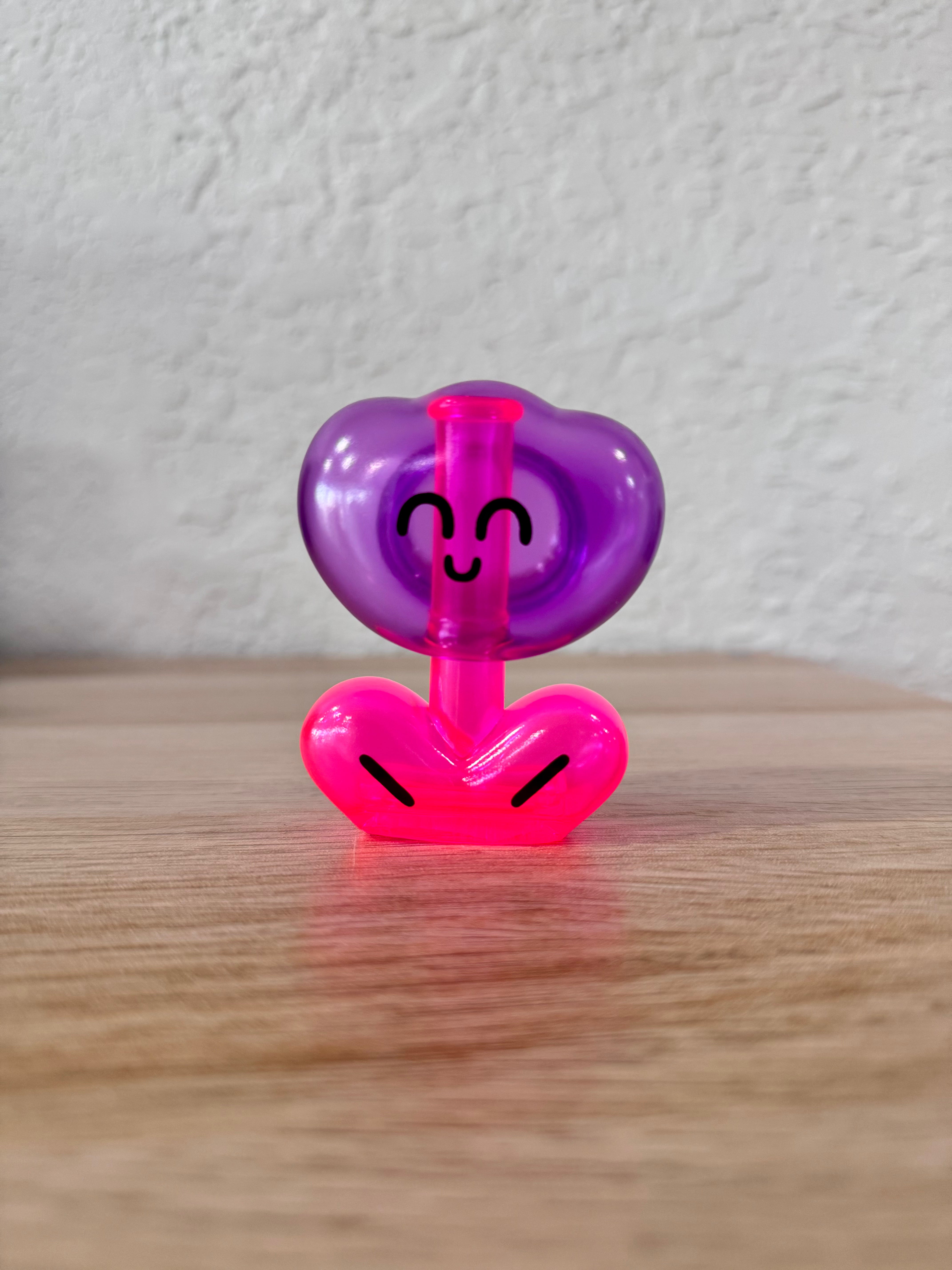Rodriguez Neon Purple by OHIGE no PON, a Japanese Sofubi toy with a face, measuring 10cm-15cm, displayed on a wooden surface.