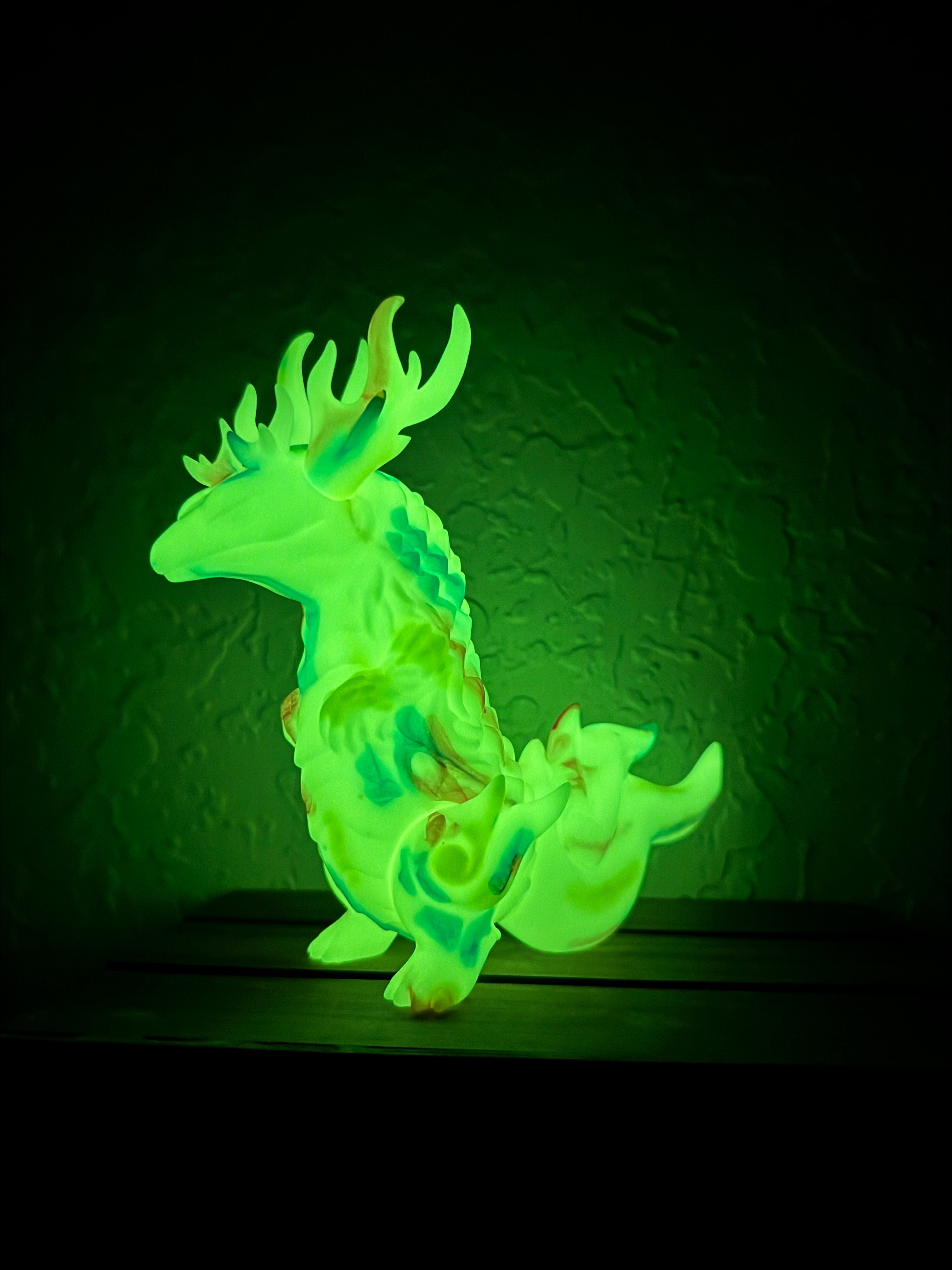 Rinkaku - Marble Rainbow GID by CORE Kashi, a 15cm tall Japanese soft vinyl dinosaur figure, glowing subtly, designed as a collectible art toy.