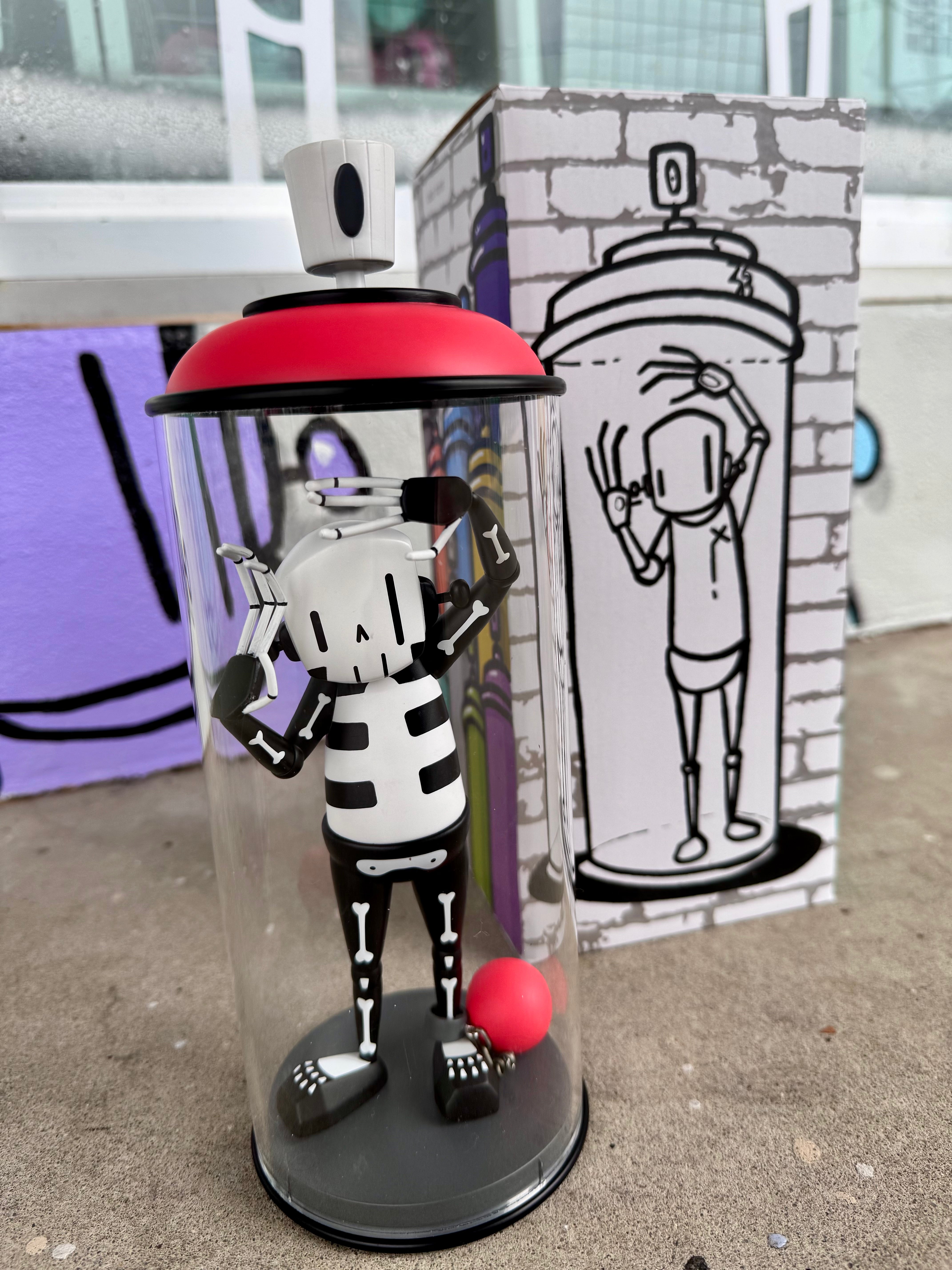Contents Under Pressure Vinyl Figure - Bones Edition by Chris RWK in spray-paint can display, featuring a skeleton character and red ball, limited to 100 pieces.
