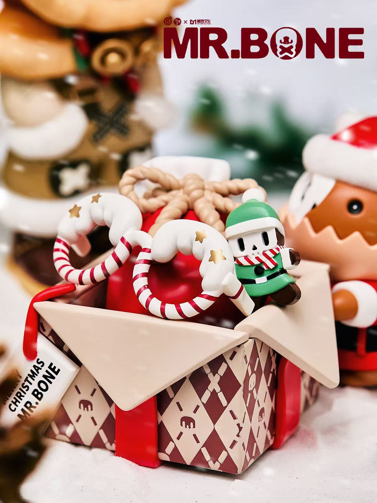 Mr. Bone (200%) - Christmas Limited Edition figurine in winter attire, sitting on a gift box with festive accessories; preorder now, limited to 300 pieces.