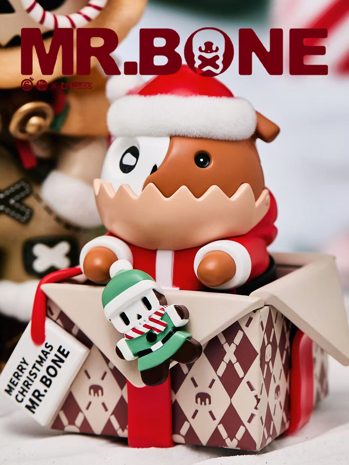 Mr. Bone (200%) - Christmas Limited Edition - Preorder: Skeleton in Santa outfit in gift box with elf charm, limited edition collectible from Strangecat Toys.