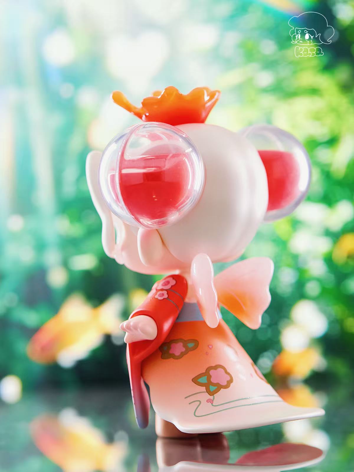 KASA 2.0 - Mystic Tales Blind Box Series: Vinyl art toy in a kimono with fish-eye bubbles and fin-like features, evoking a goldfish design.