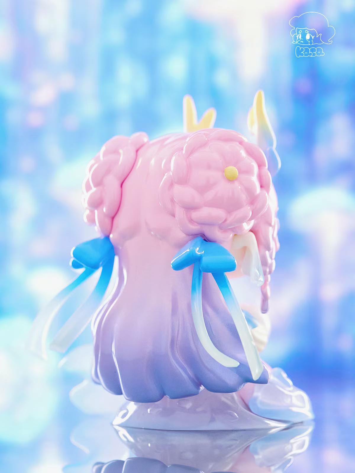 KASA 2.0 - Mystic Tales figurine with pink braided buns, blue ribbons, and gradient hair, showcasing collectible artistry in blind box series.