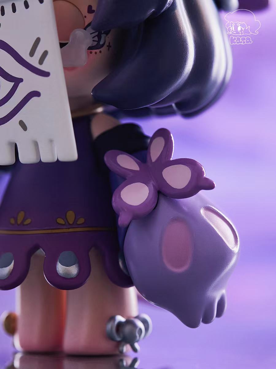 KASA 2.0 - Mystic Tales Blind Box figure in purple dress, holding ghost mask and lavender skull, featuring dark bobbed hair, against a purple background with K333. logo.