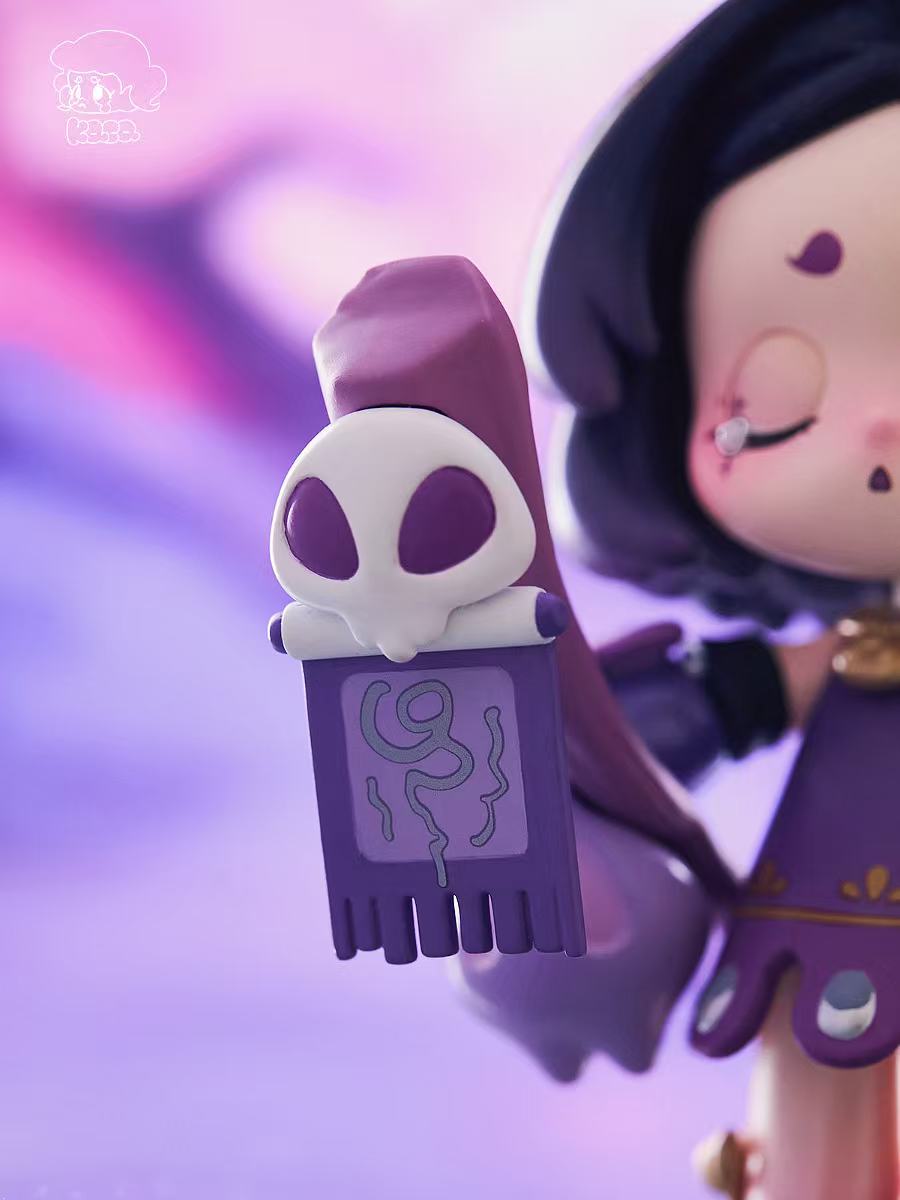 KASA 2.0 - Mystic Tales Blind Box Series figure, featuring closed eyes, heart tear, and holding a mini-banner with a skull-like top.