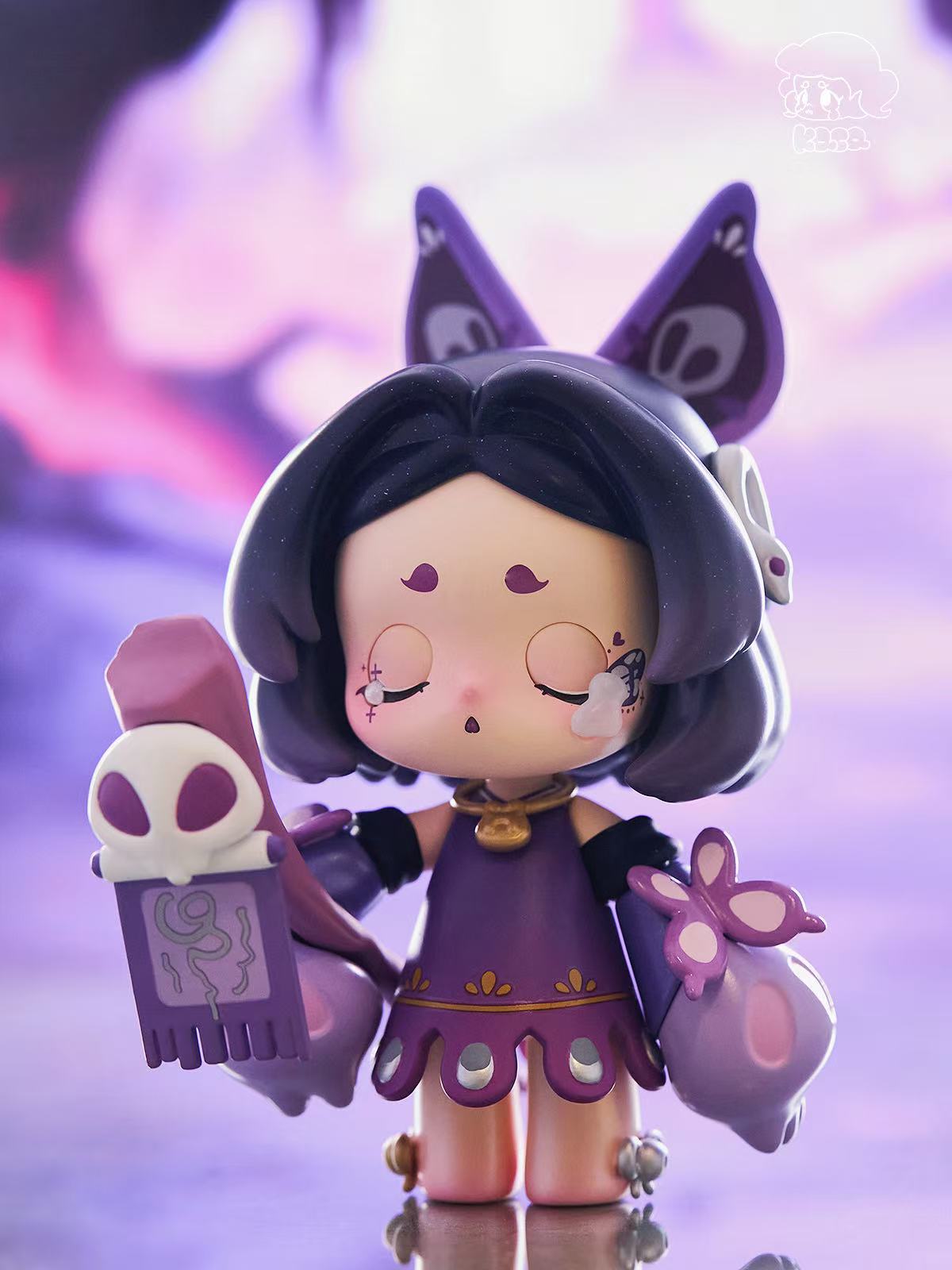 KASA 2.0 - Mystic Tales Blind Box Series: Chibi-style vinyl toy of a witch-like girl with staff, closed eyes, and cat-ear headgear, 12CM PVC collectible.
