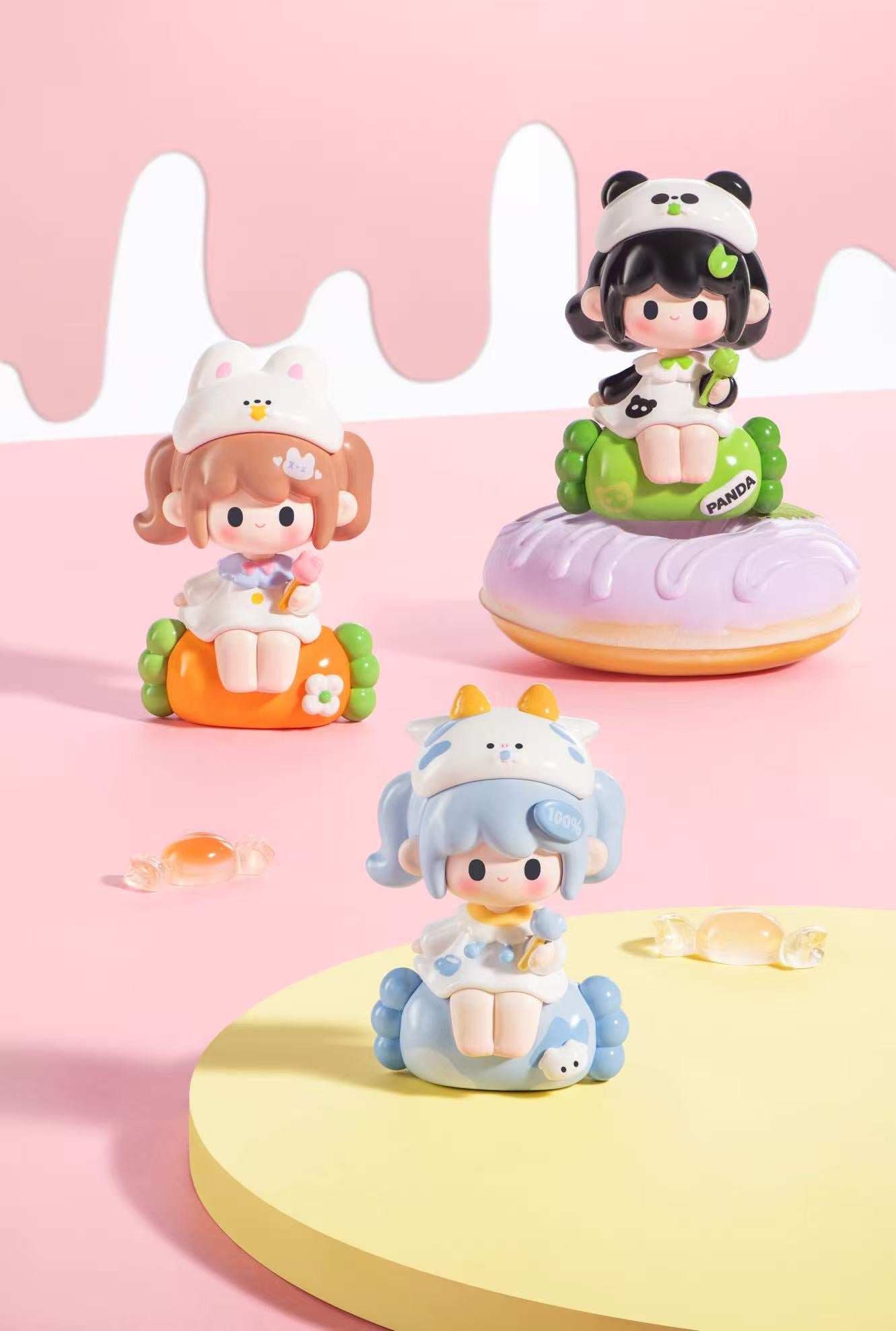 UUTIY Sweety Land Blind Box Series featuring three chibi figures in animal hats on candy cushions, highlighting blind box collectibles from Strangecat Toys.