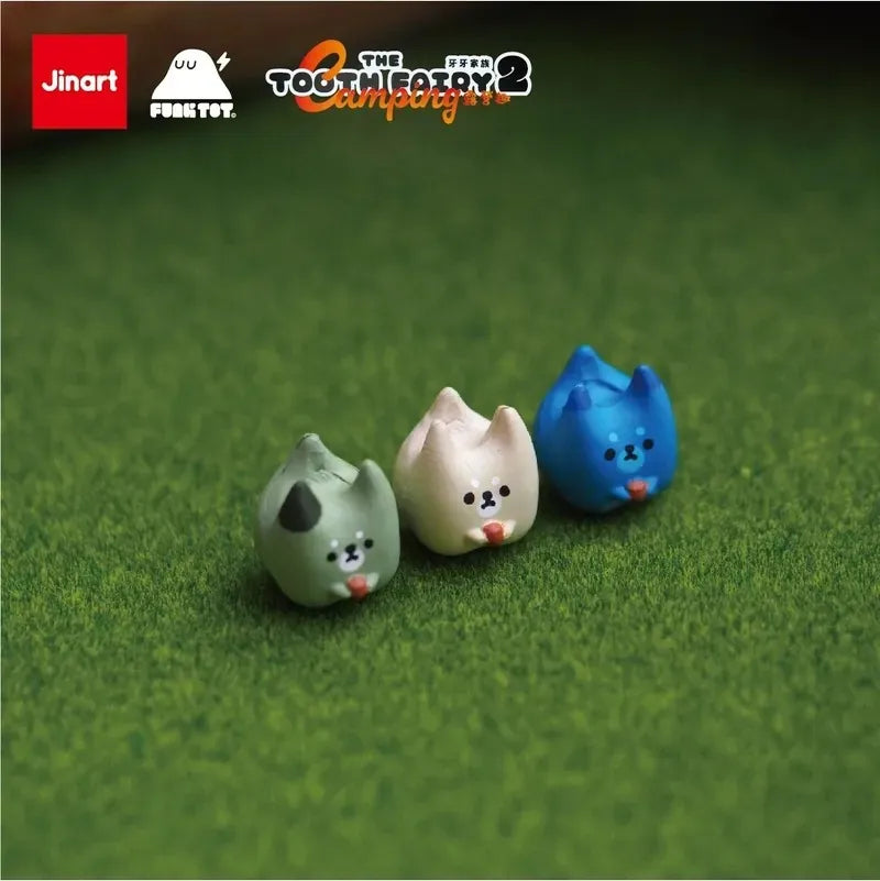 A group of small toys featuring cartoon characters from the TOOTH FAIRY SERIES 2 HAPPY CAMPING Blind Box Series.