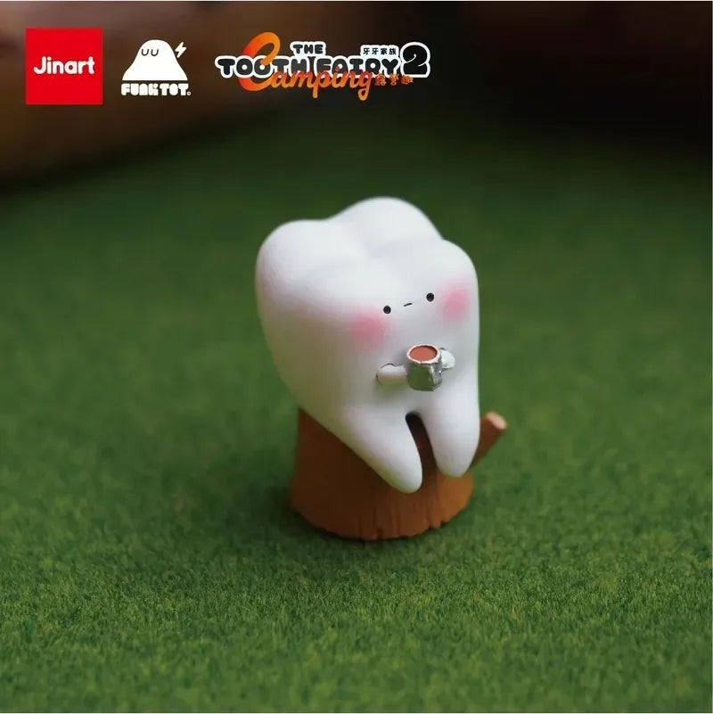 A small tooth holding a cup of coffee, part of the Tooth Fairy Series 2 Happy Camping Blind Box Series.