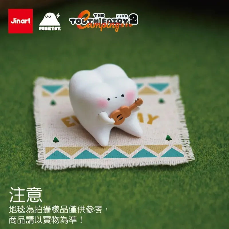 A miniature toy tooth playing a guitar, part of the Tooth Fairy Series 2 Happy Camping Blind Box Series.