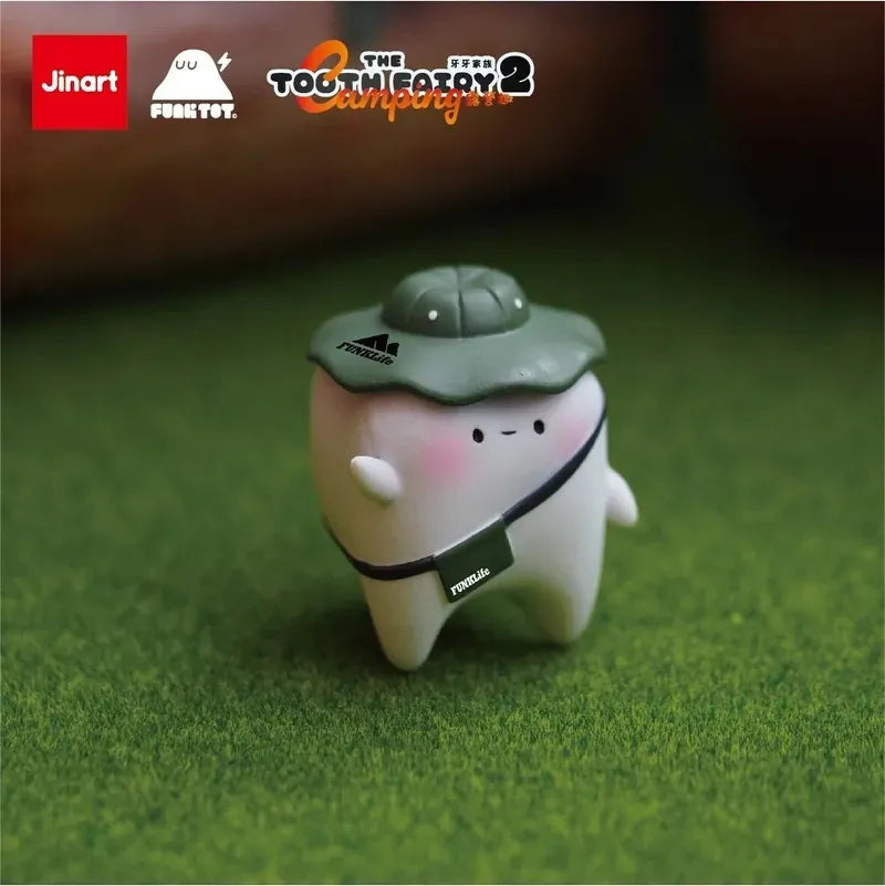 A small ceramic figurine with a hat from TOOTH FAIRY SERIES 2 HAPPY CAMPING Blind Box Series.