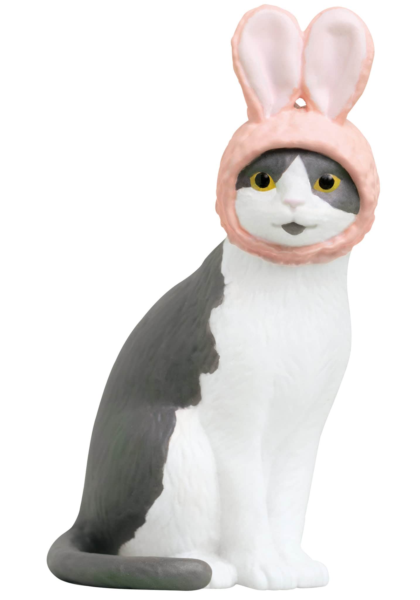 A Cat Cap Figure Blind Box collectible featuring a cat figurine with pink bunny ears, embodying the whimsical charm of Strangecat Toys' art toy collection.