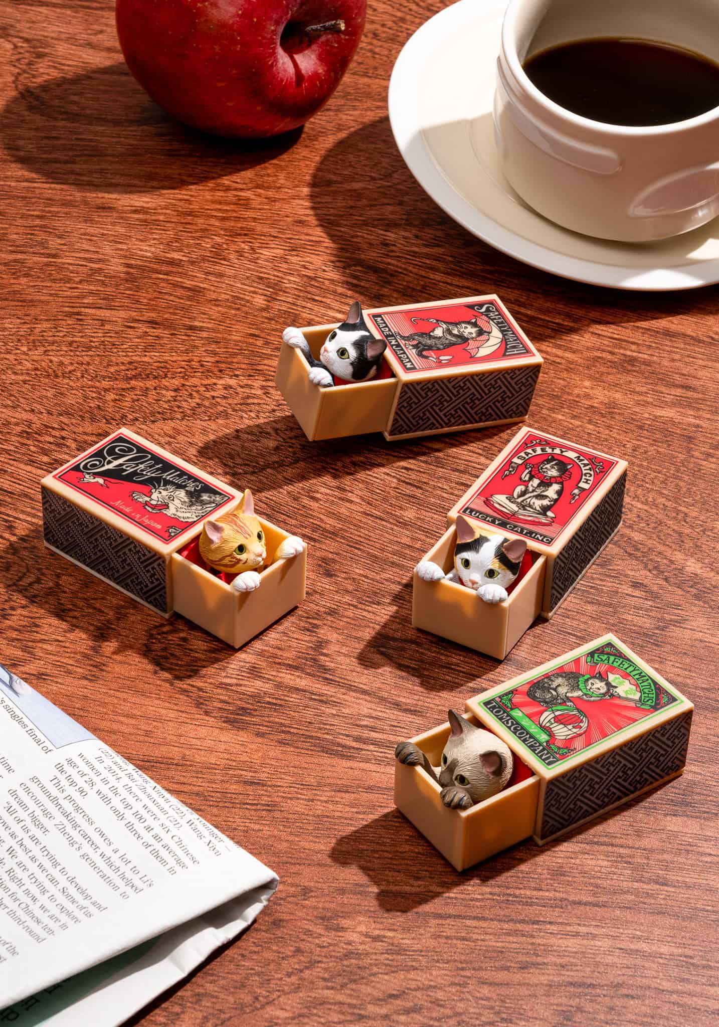 Cat Peek Matchbox Blind Box featuring small cat figurines playing peekaboo in matchboxes, perfect for desks or shelves, with eight unique variations.