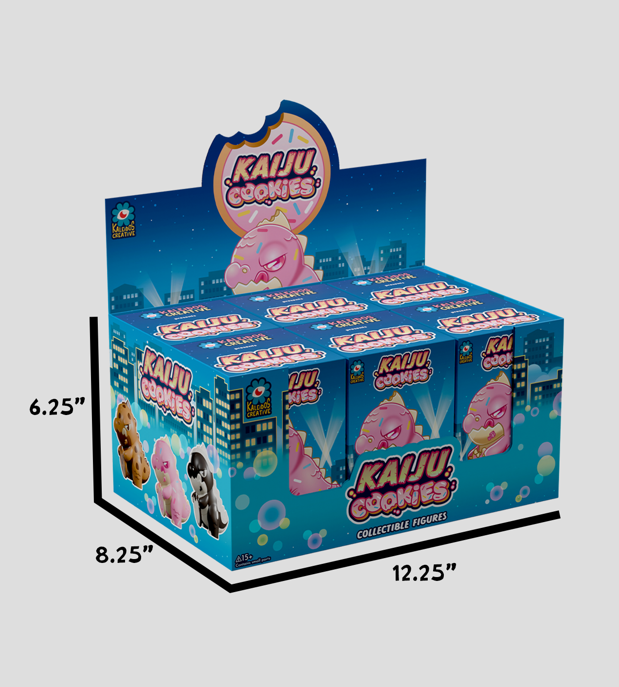 Kaiju Cookies Blind Box display, featuring a cityscape backdrop, donut logo, and three cookie monster figures. Includes 6 designs, 1 secret, and product warnings.