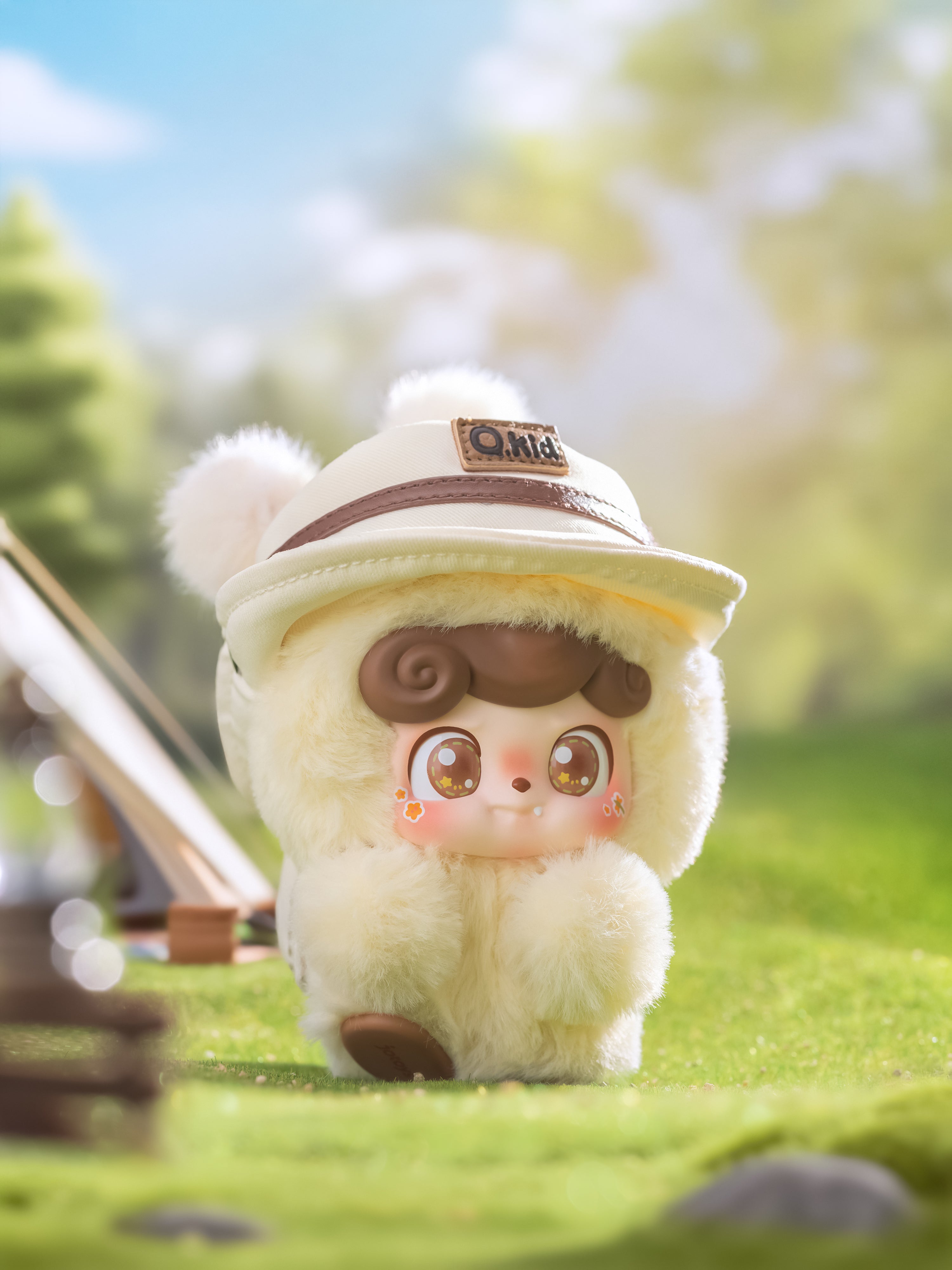 Q. Kid Outdoor Activities Series PVC Plush Blind Box: a collectible toy in a sheep suit with starry eyes, posed on grass. Preorder now for end of Q4 2025.