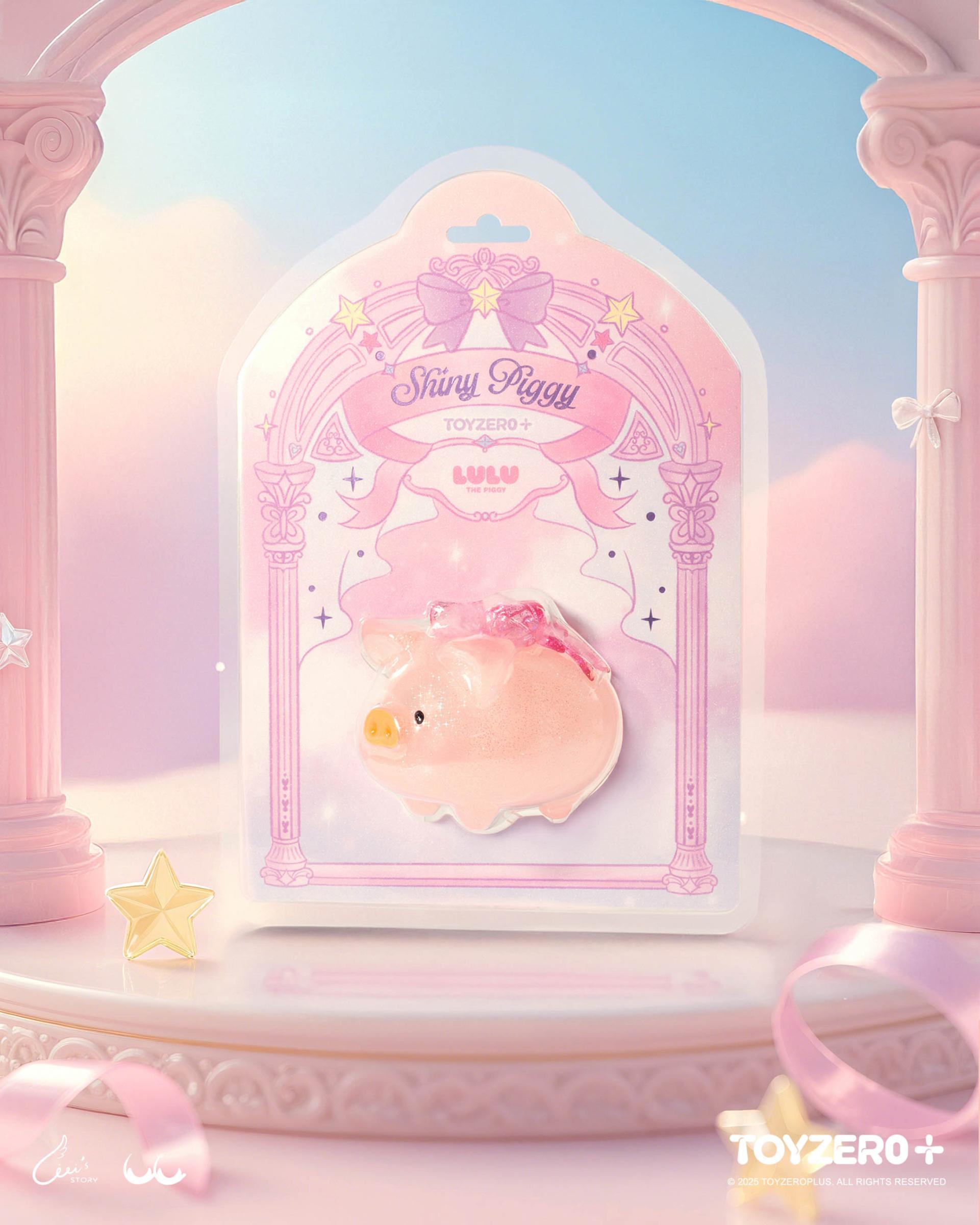 LuLu the Piggy - Shiny Piggy figurine in a glittery pink, sealed in a decorative package, featuring magical-girl motifs, for preorder from Strangecat Toys.