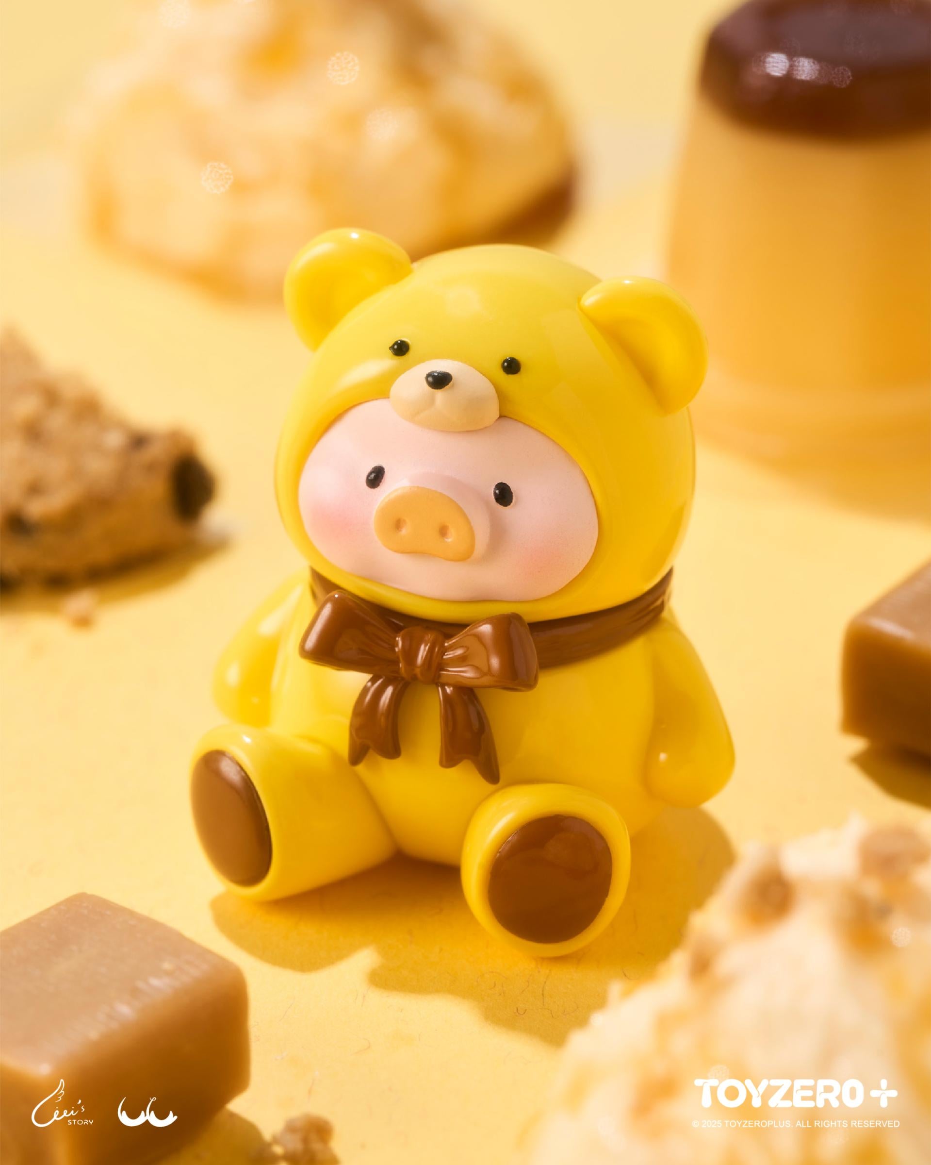 LuLu the Piggy - Teddy MINI Limited Edition (Summer Chill) vinyl figure in a bear costume, surrounded by desserts, indicating it's a collectible designer toy.