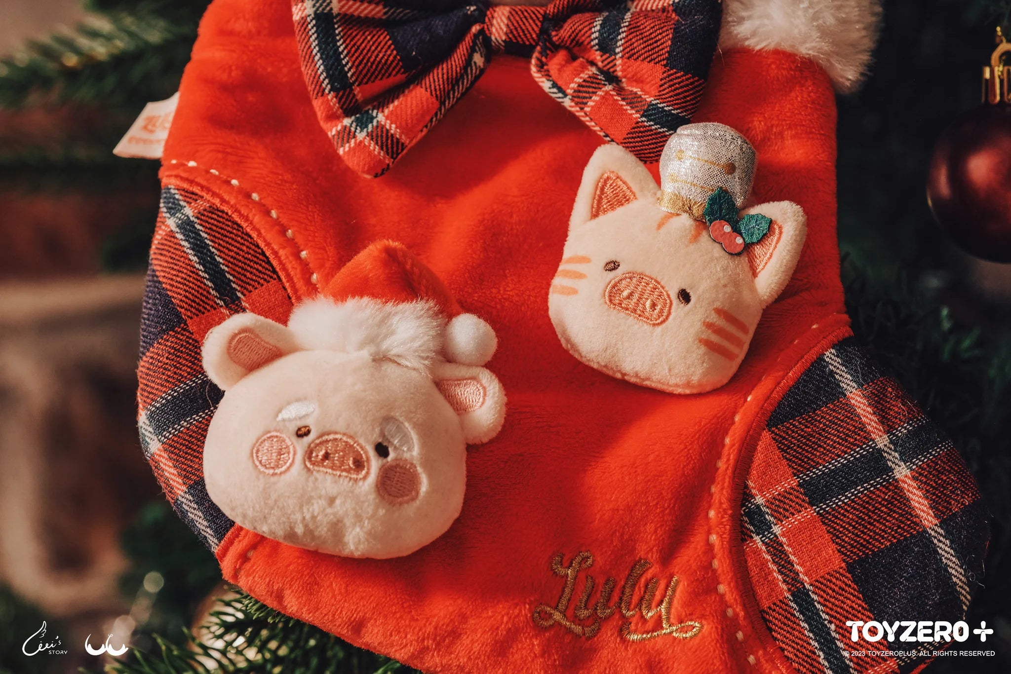 LuLu the Piggy X'Mas - Christmas Sock Charms featuring red bib, plaid vest, and stuffed animals.