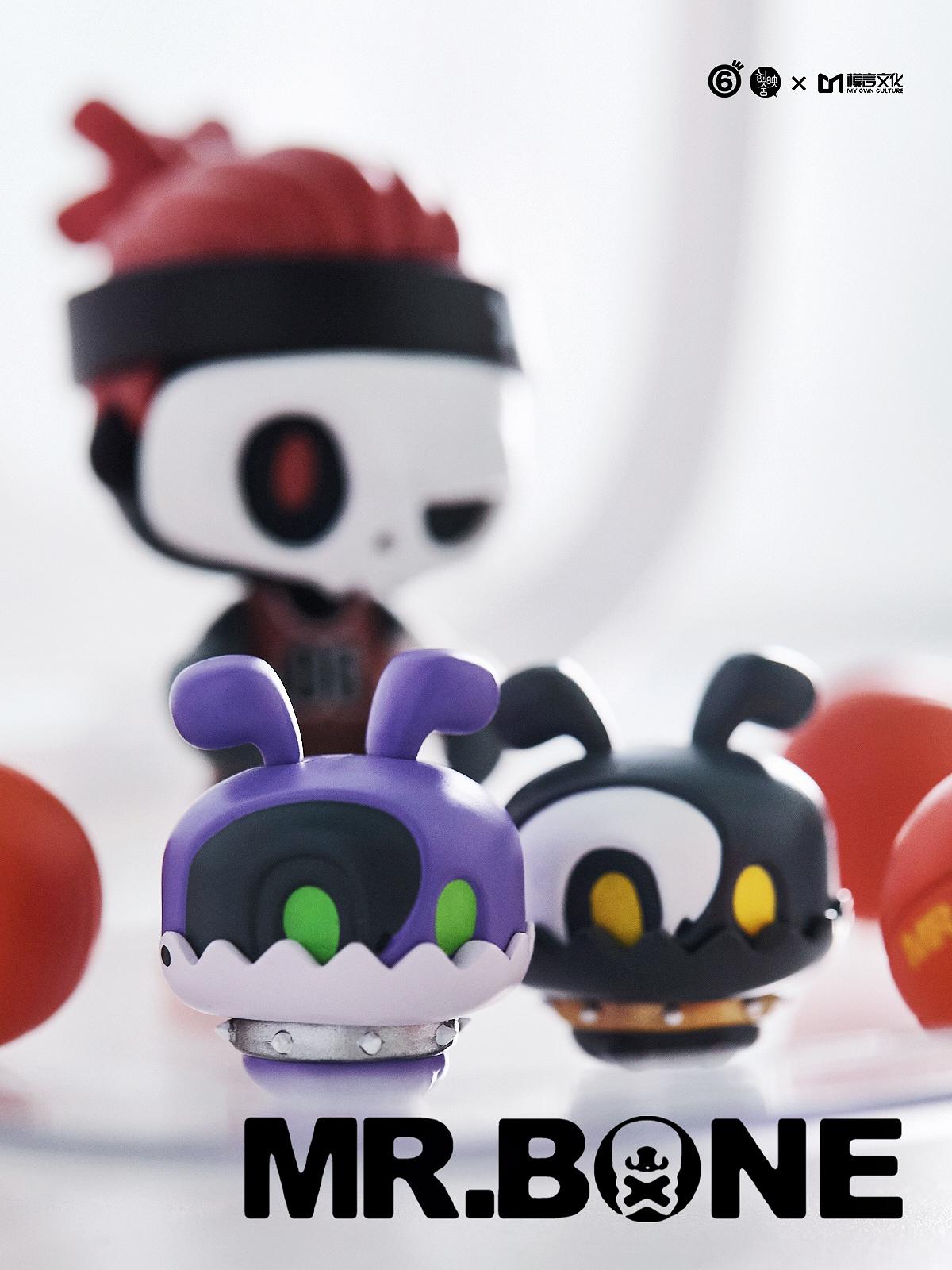 MR.BONE JR ZOMBIE DOGS toy, 4 CM PVC figure, featuring a purple and black cartoon character, part of a quirky collectible set on a table.
