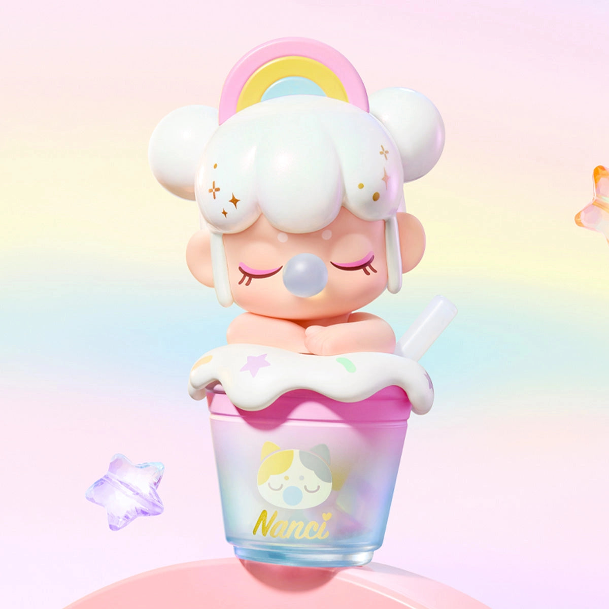Rolife BabyNanci Surprise Figure Doll in a dessert cup with sleepy-cat logo, featuring glow-in-the-dark ice cubes and whimsical star accents.