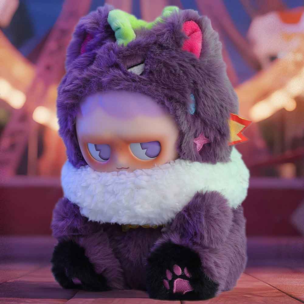 MONBOO-Monster Paradise Series Plush Blind Box features a grumpy-faced figure in a purple animal costume with a rainbow horn and embroidered stars.