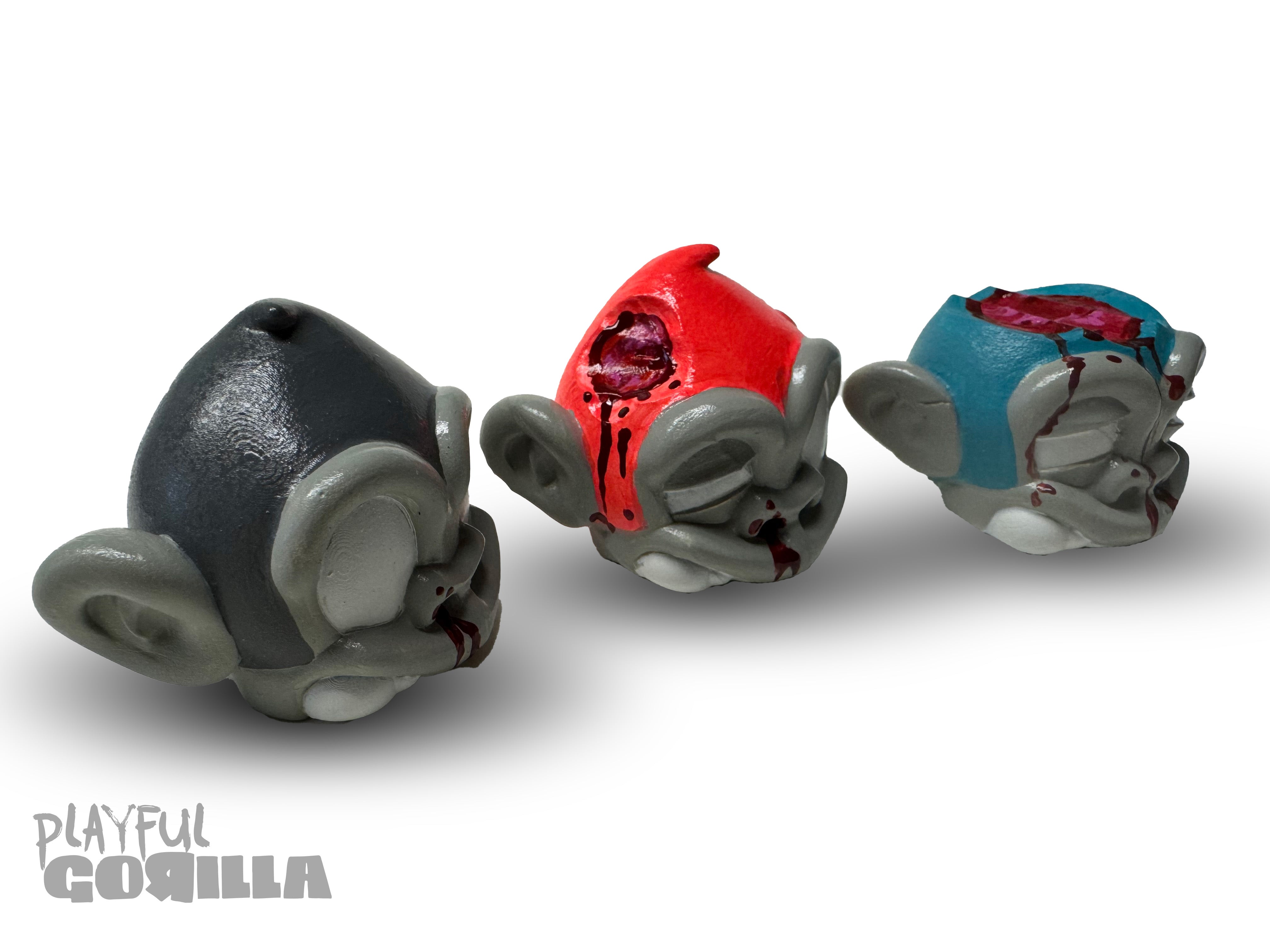Bite Me - MonkeyBites by Playful Gorilla, featuring 3D printed resin figurines with blood effects, captured in a detailed group shot for Strangecat Toys.