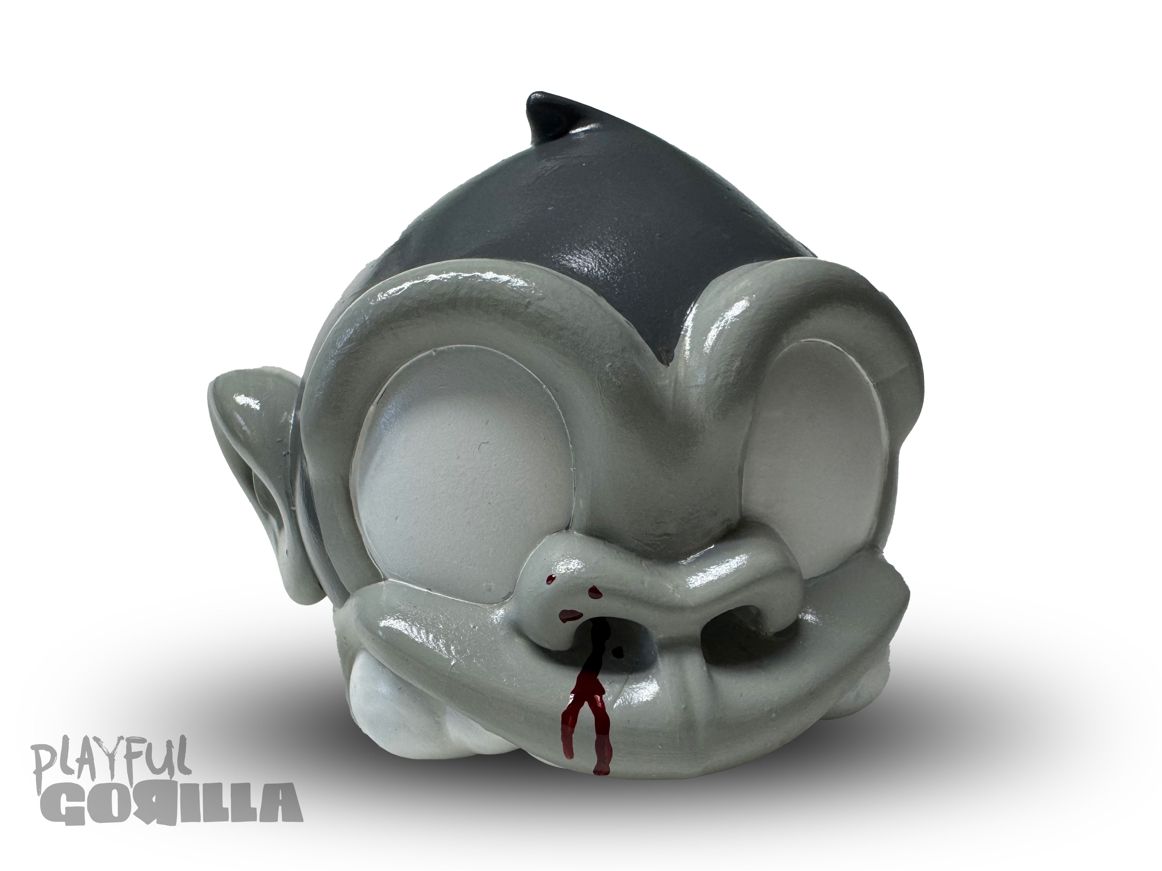 Bite Me - MonkeyBites by Playful Gorilla: A grey and white 3D-printed toy with red accents, part of a limited edition art toy set.