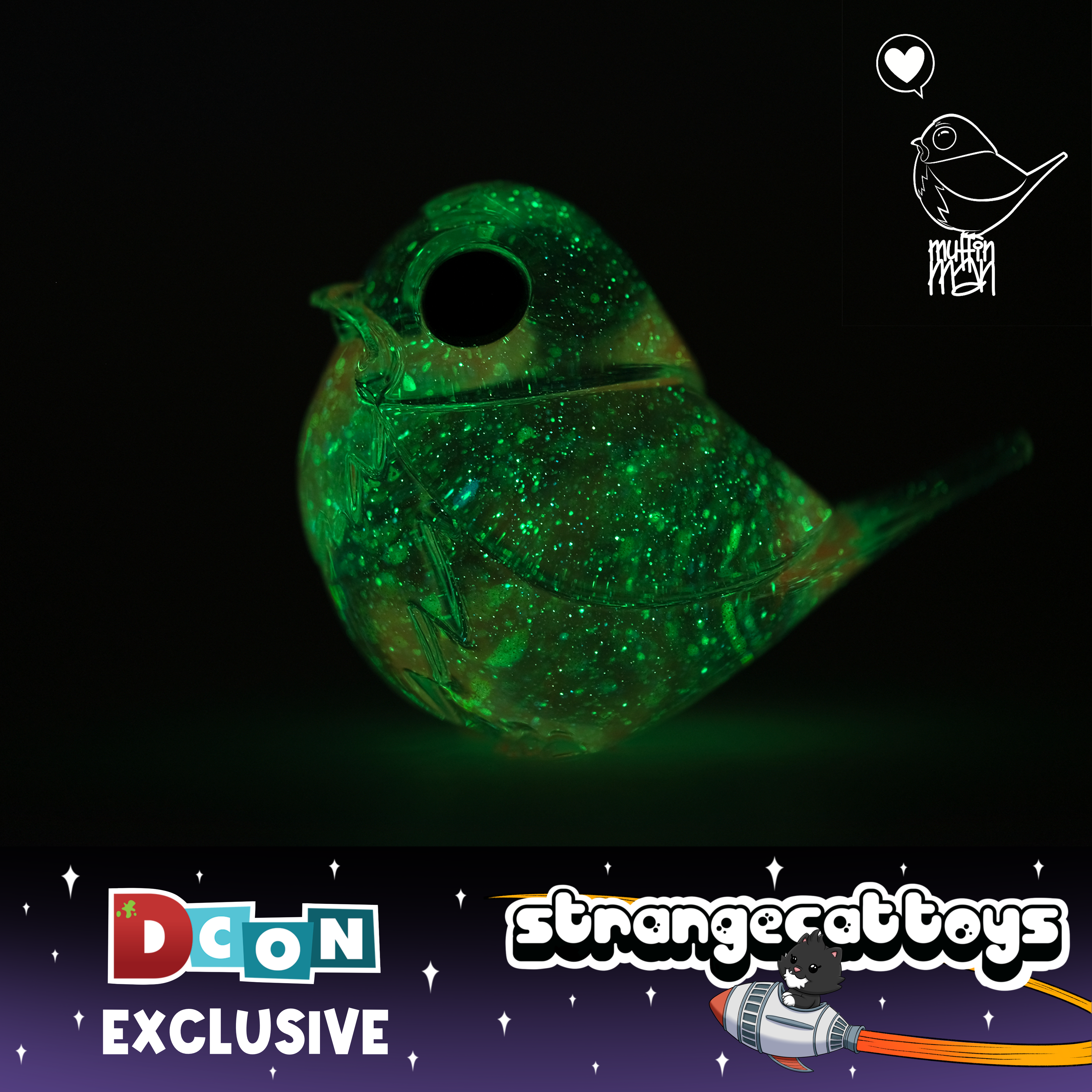Pink Twinkle Robin by Muffin Man, a glowing bird-shaped collectible with speckles, features DCon Exclusive and Strangecat Toys' cat-astronaut logo.