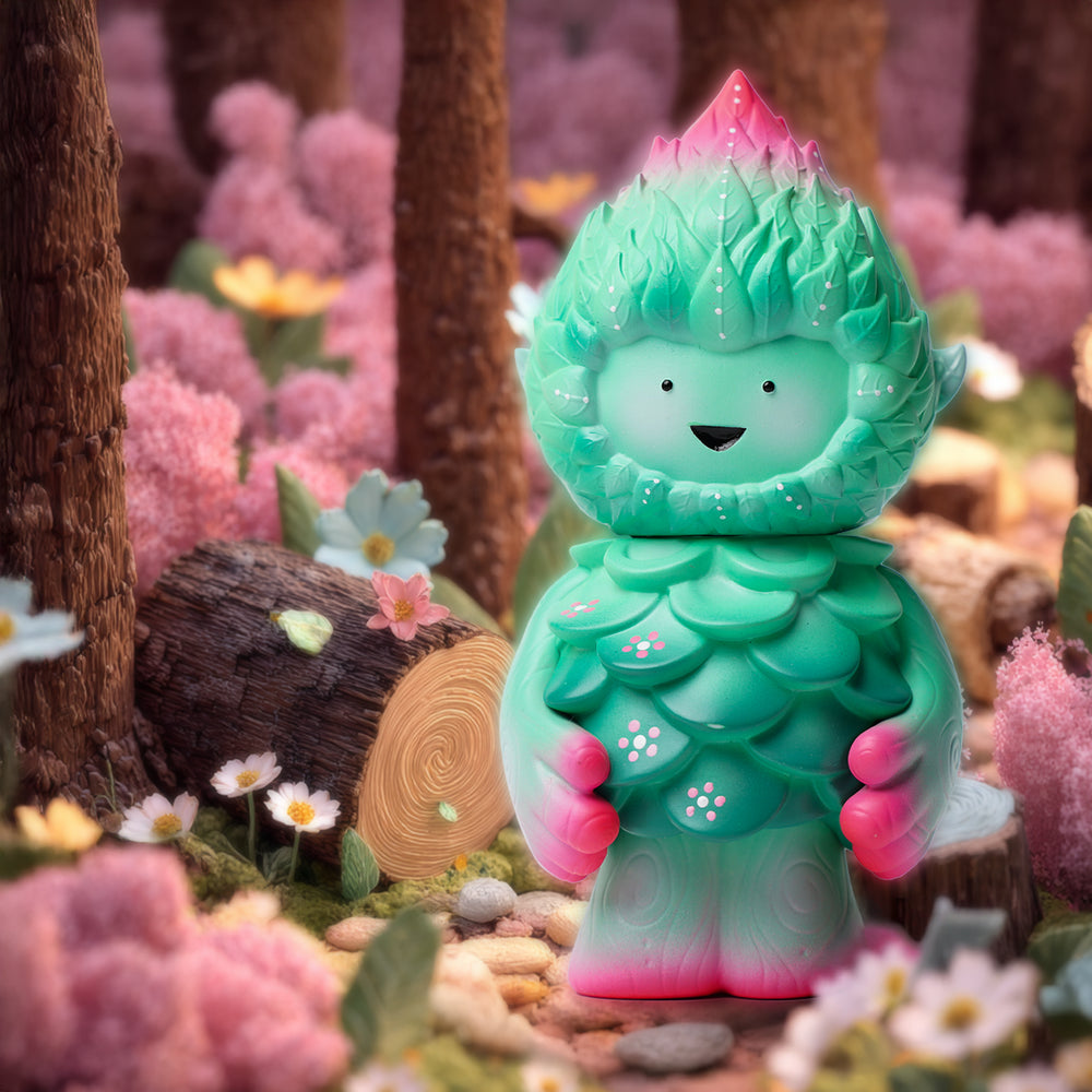 MUJUWORLD TREE SPIRIT SPRING EDITION - Preorder: A whimsical, leaf-scaled art figure in a fairy woodland scene, crafted from soft vinyl, approx 4 tall.