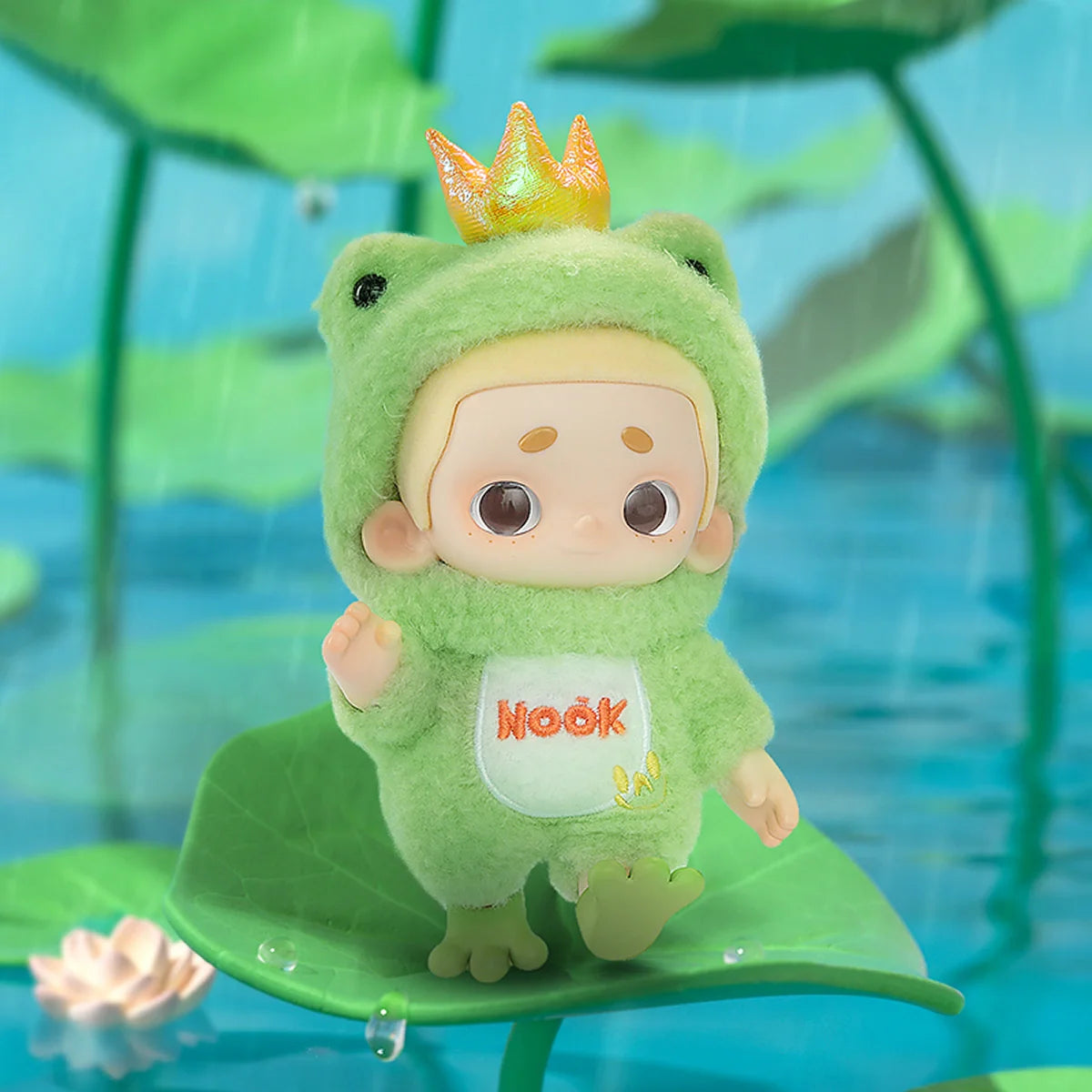 NOOK Plush Doll Blind Box First Release - OOTD: Figurine in frog suit with crown, standing on lily pad, preorder for six designs or exclusive secret.