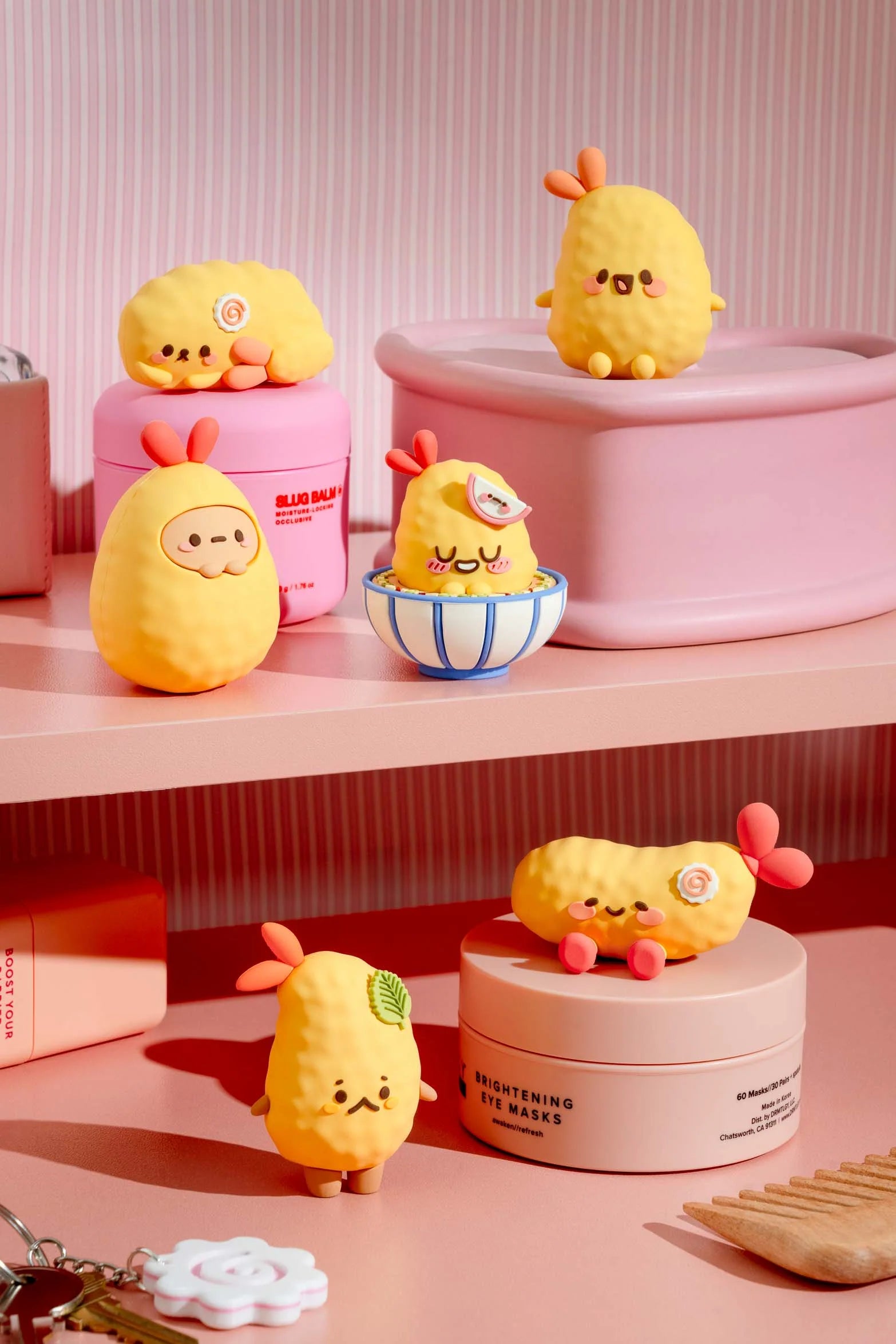 Smoko Tempura Shrimpie Blind Box Figures on pink beauty jars, featuring kawaii-style expressions and accessories, perfect for collectors at Strangecat Toys.
