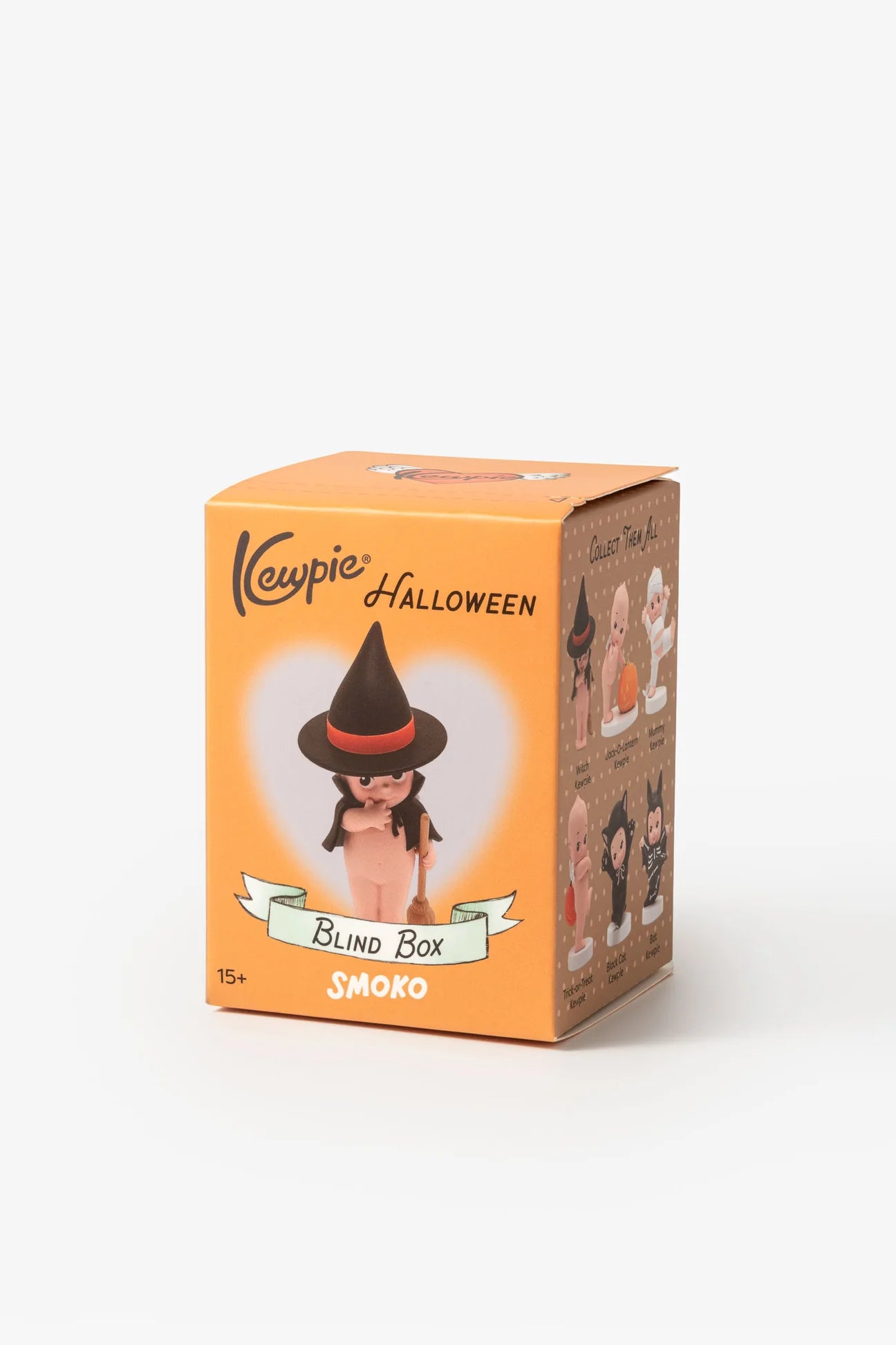 Smoko Kewpie Halloween Blind Box, featuring surprise collectible Kewpie figures in Halloween themes like Witch and Mummy. Box shows Kewpie in witch hat.