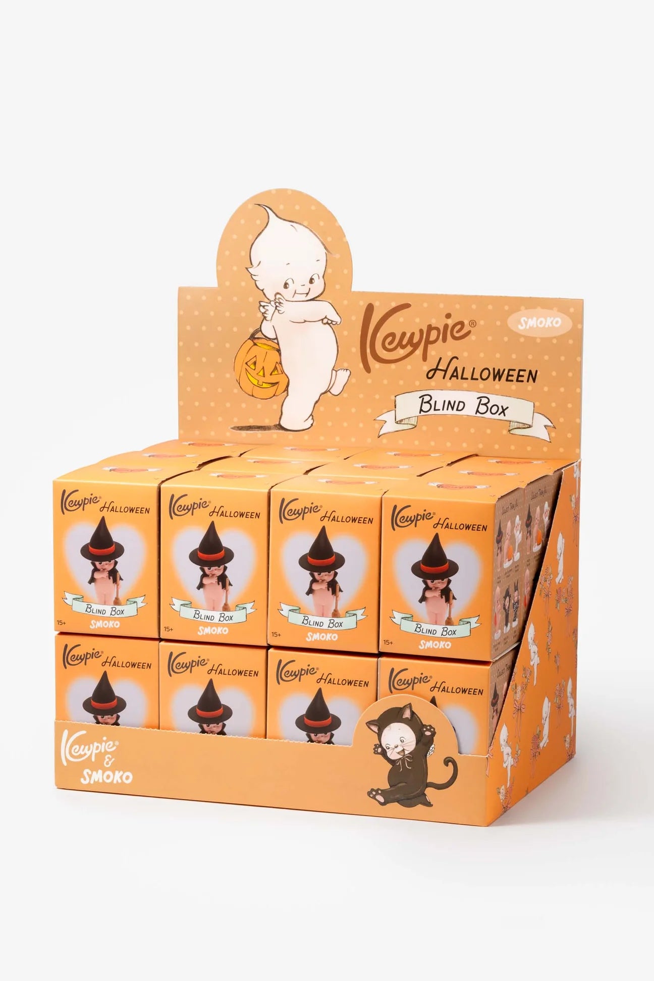 Smoko Kewpie Halloween Blind Box Figure display featuring witch-hat Kewpie illustrations on each package, part of the collectible Kewpie series at Strangecat Toys.