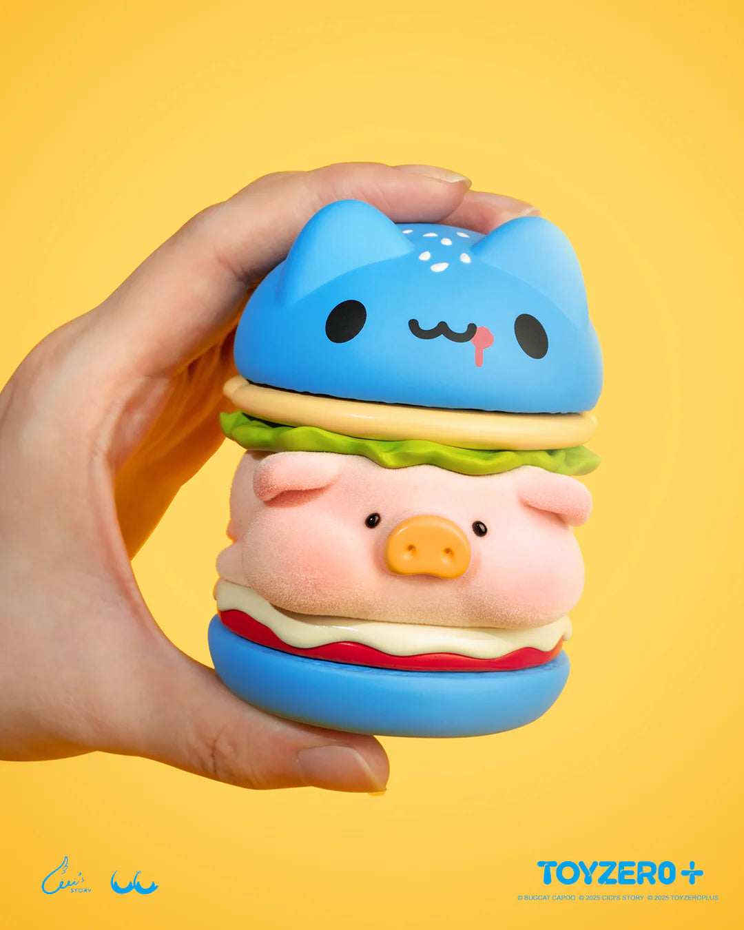 Hand holding LuLu the Piggy x Capoo - LuLuBurger toy with a cat-shaped bun and pig-faced patty, featuring detachable magnetic layers for creative customization.