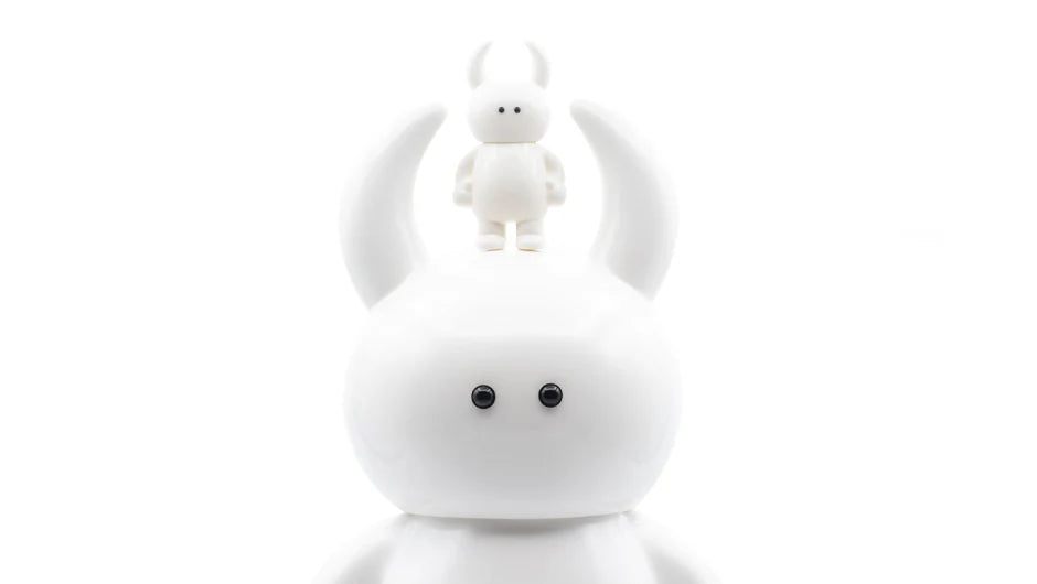 PEARL? BIG UAMOU figure, soft vinyl with fine pearl details, features horn-like ears, black dot eyes, and a smaller identical figure atop its head.