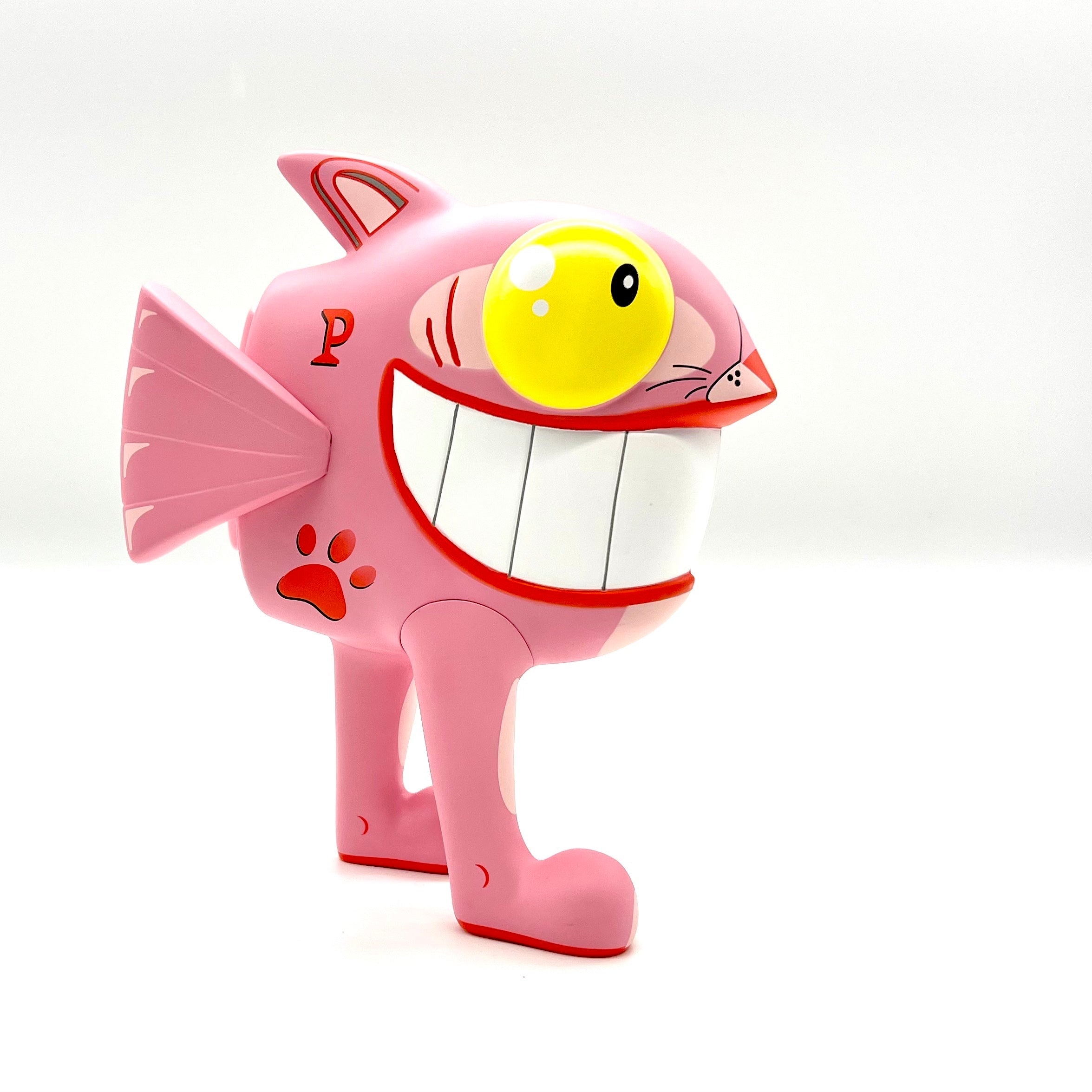 Pez - The Walking Fish Pinky vinyl figure, 7 tall, limited edition collectible by UVD Toys, featuring a playful pink cat design with distinct yellow eyes.