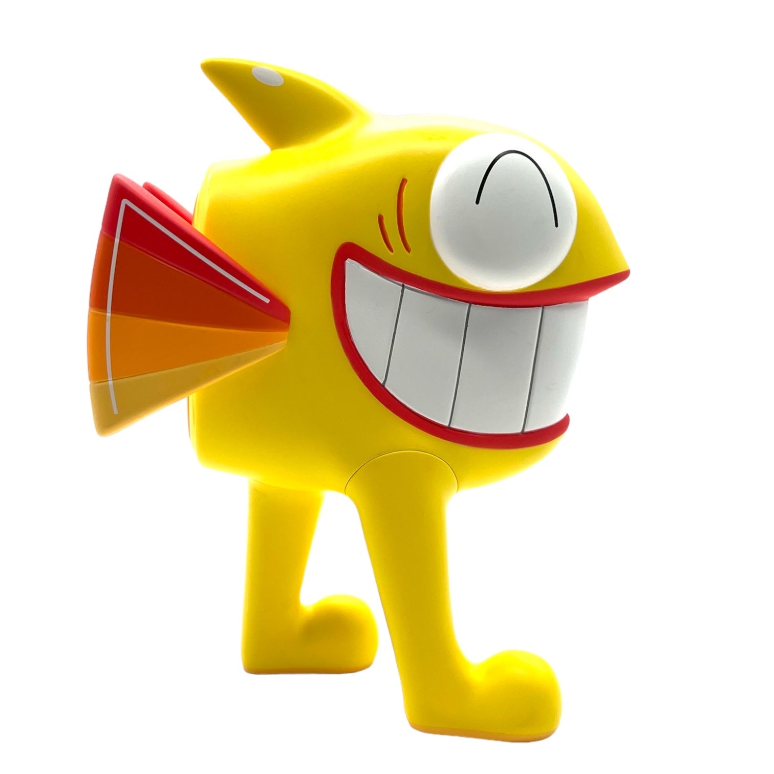 Pez - The Walking Fish Yellow vinyl figure, featuring a smiling cartoon fish design, part of a limited edition by UVD Toys.