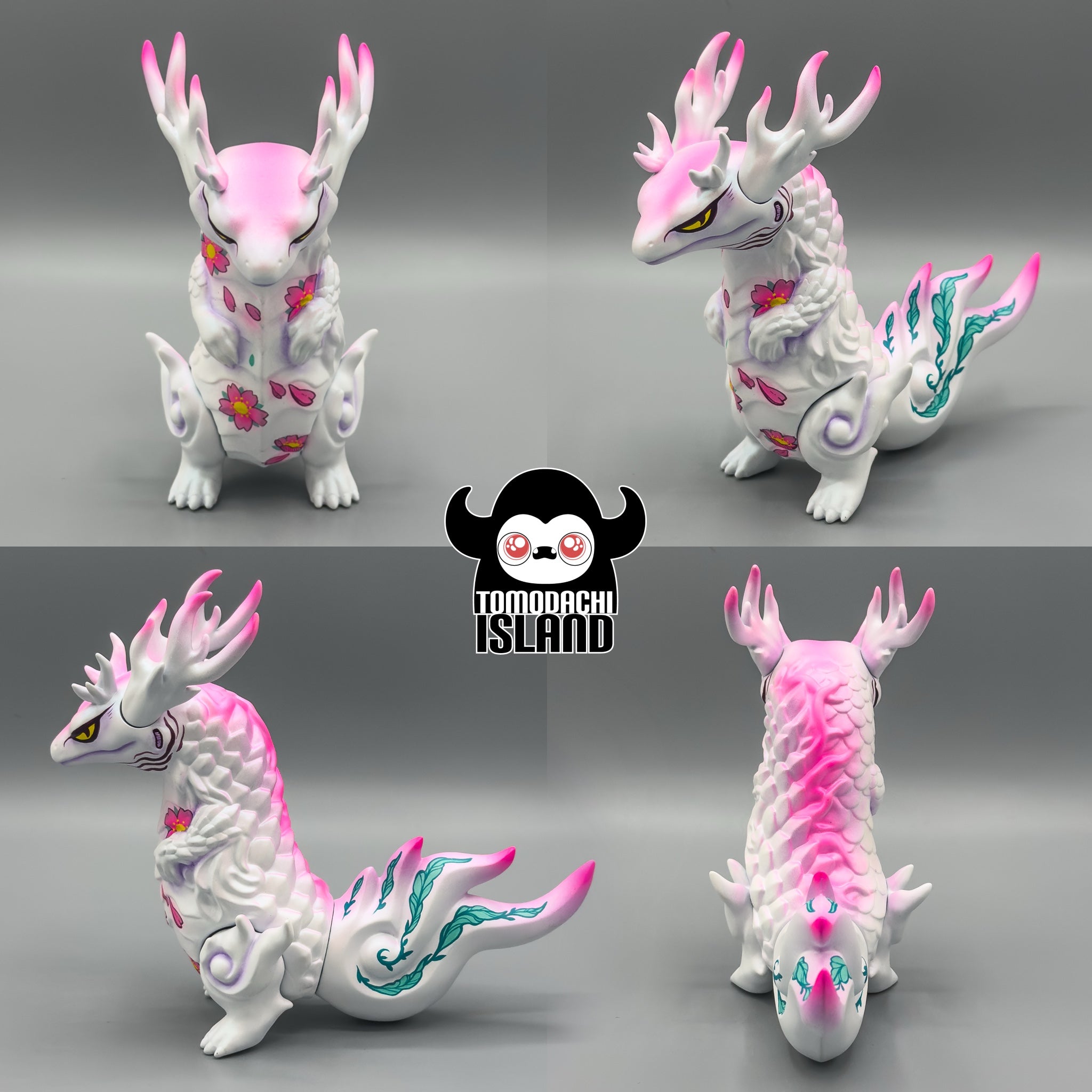 Celestial Abyss - Rinkaku Sakura vinyl figure with pink-gradient antlers, cherry-blossom motifs, yellow eyes; limited edition, hand-painted with UV reactive pink and turquoise iridescence.