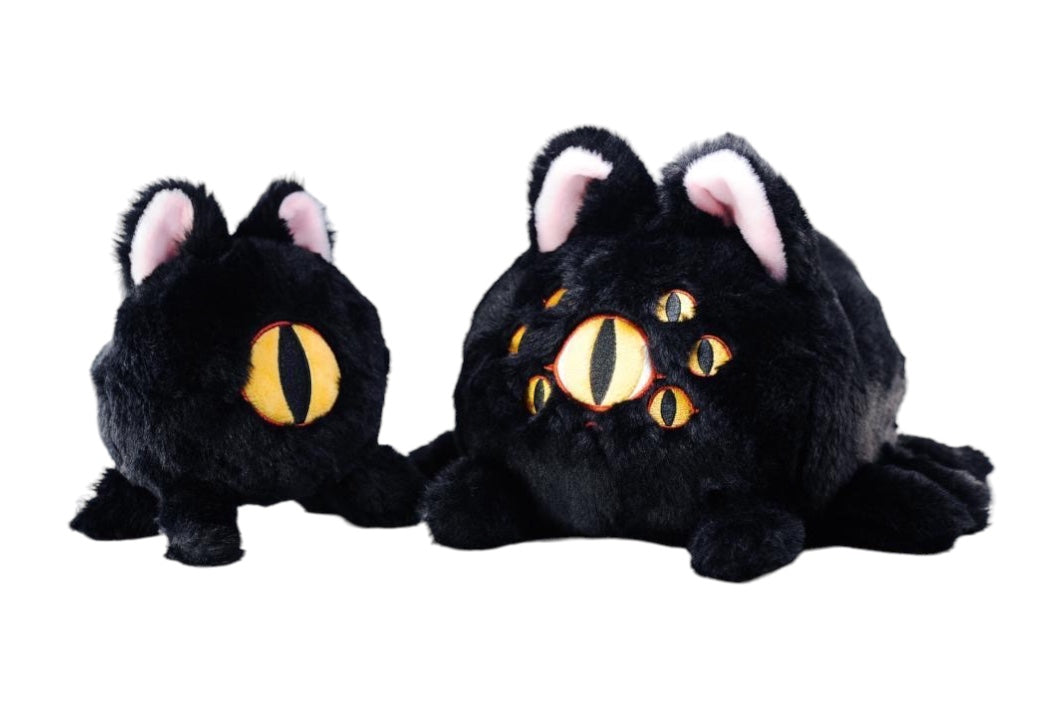 Spider Cat Plush by Abao, a toy animal figure with yellow eyes, close-up of eye detail.