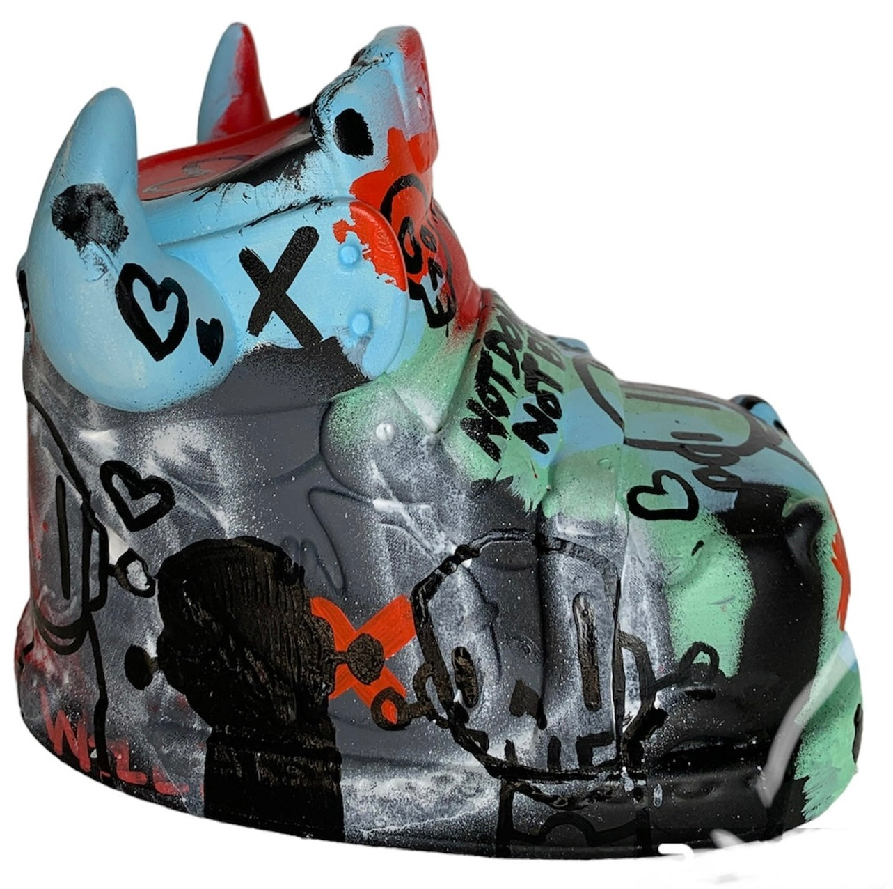 Close-up of a toy sculpture titled Where Have I Seen This Before - Can I Kick It by Chris RWK, mixed medium on Vinyl.