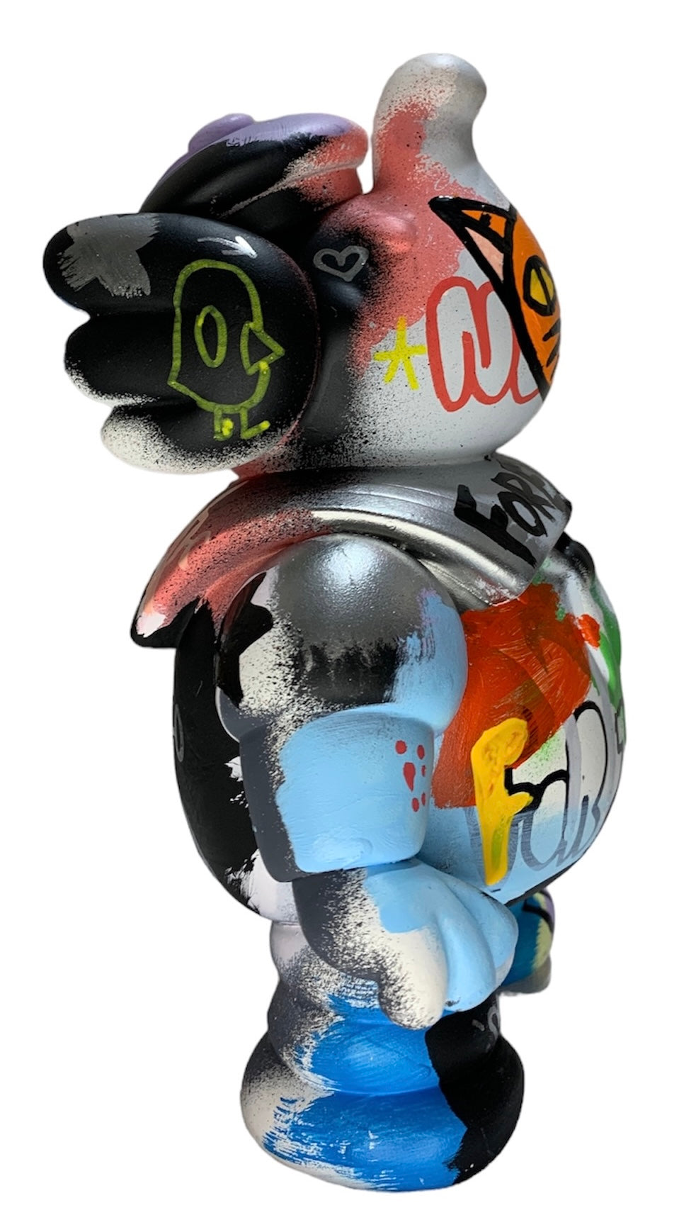 Cartoon animal figure toy close-ups and red/white sign, blue/white marshmallow statue, and more in Please Remember by Chris RWK.