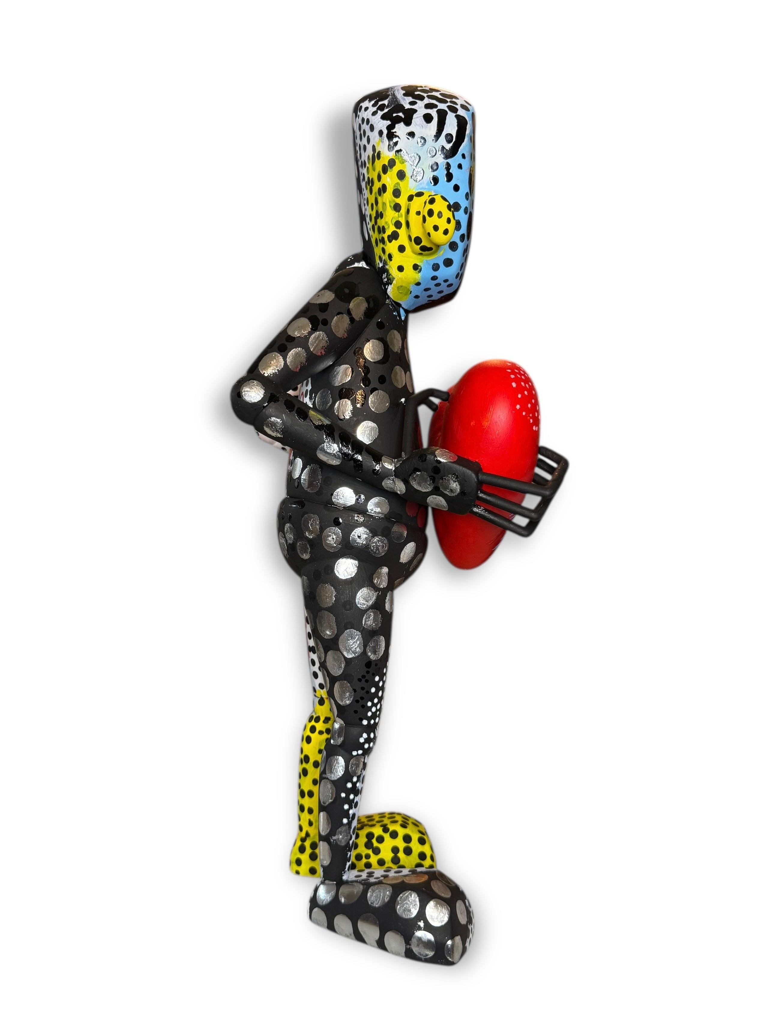 Time Will Tell - Pop by Chris RWK: A 15 vinyl sculpture with a matte black body, silver dots, colorful block head, and red oval object.