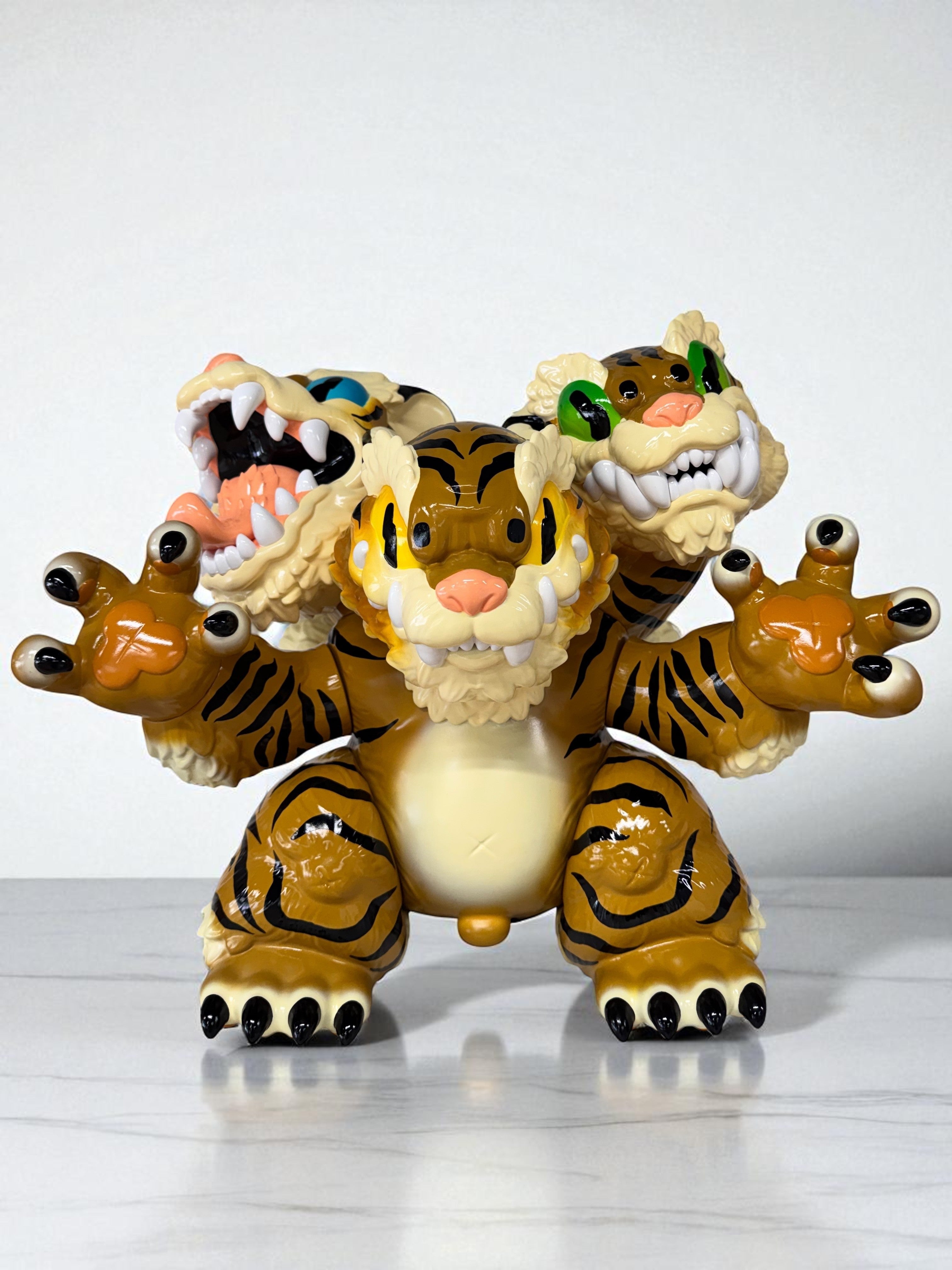 Three Headed Fierce Tiger Koshow, a 6-inch soft vinyl toy with a unique paint design by Candie Bolton, limited to 100 pieces.