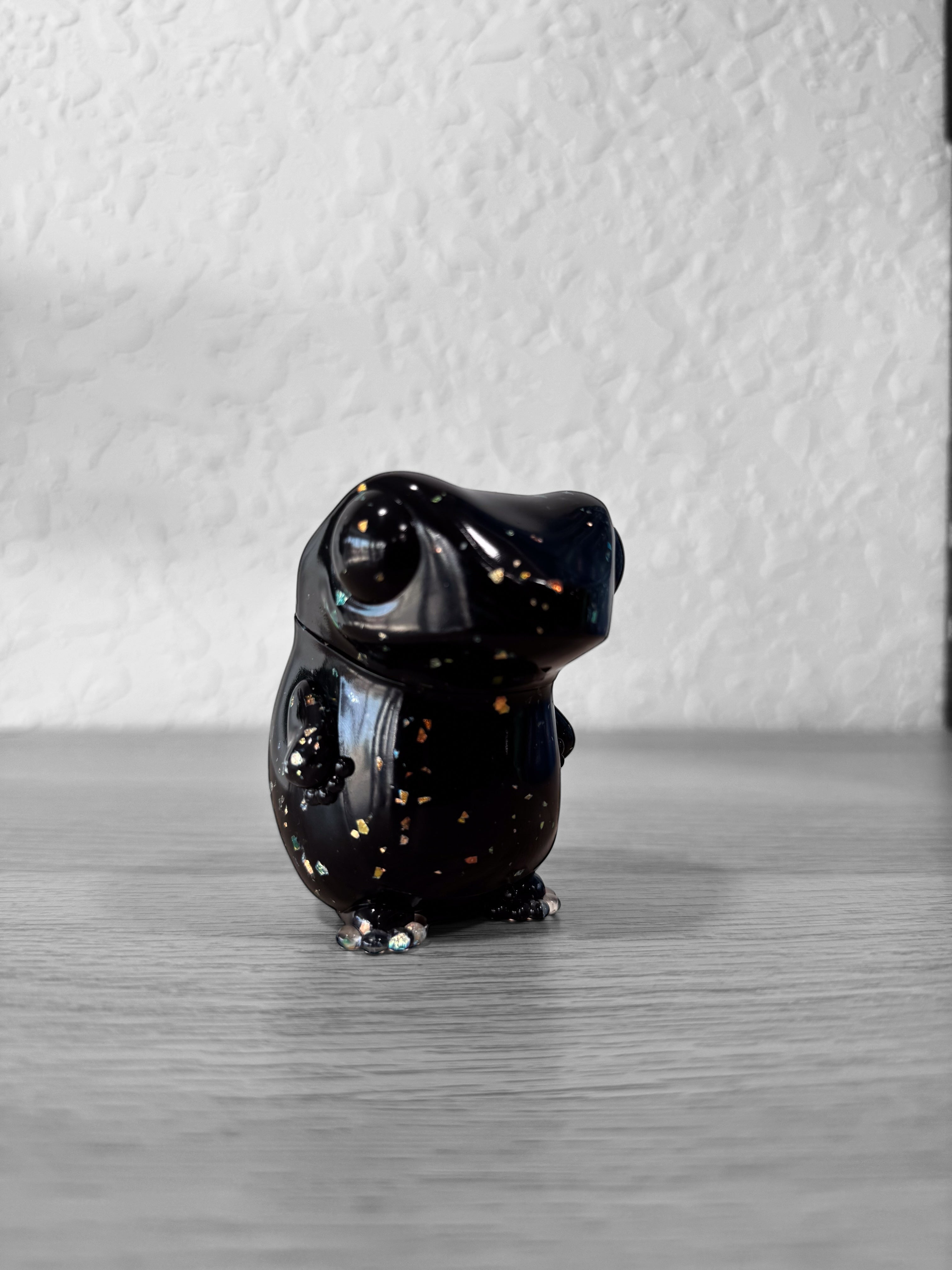 Froggy - Fake Mother of Pearl by Frog Tree: A black frog figurine with gold specks, crafted in Japanese soft vinyl, 8cm tall.