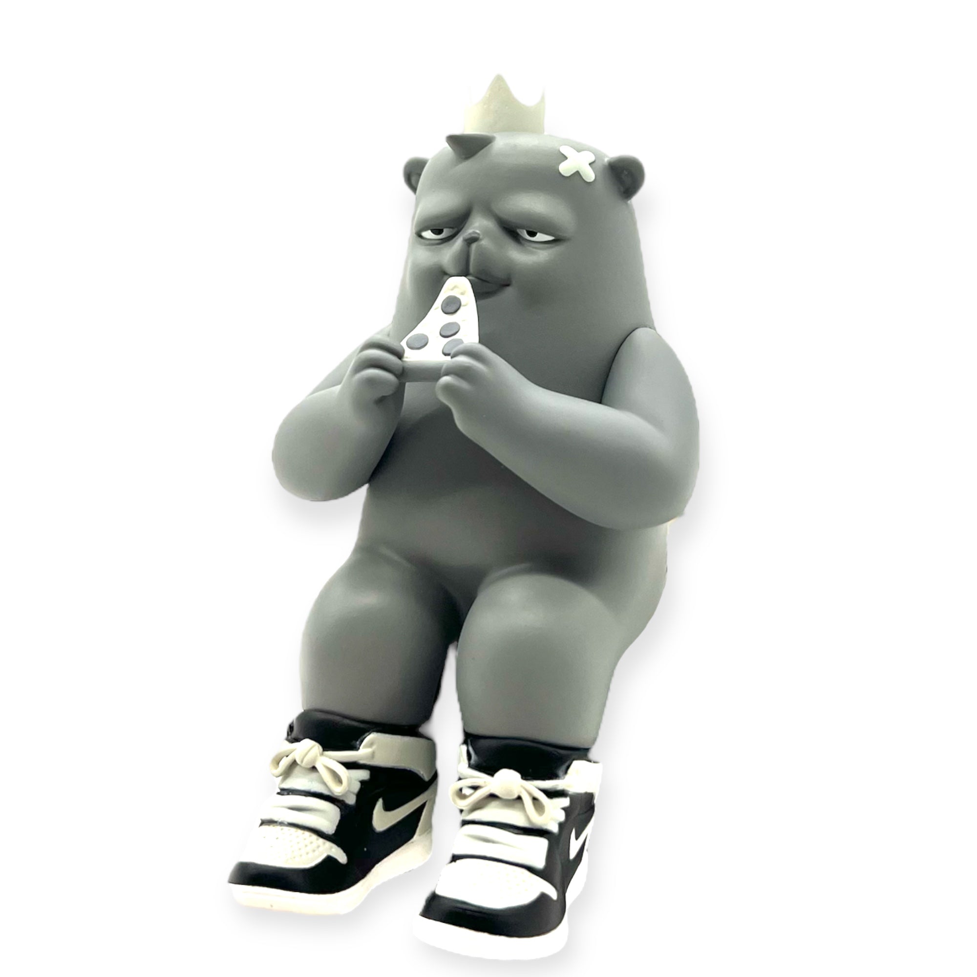 Chunky Boy Mono The Bear Champ Vinyl by JC Rivera, a grey toy bear with a crown and shoes, holding pizza, seated for shelf display.