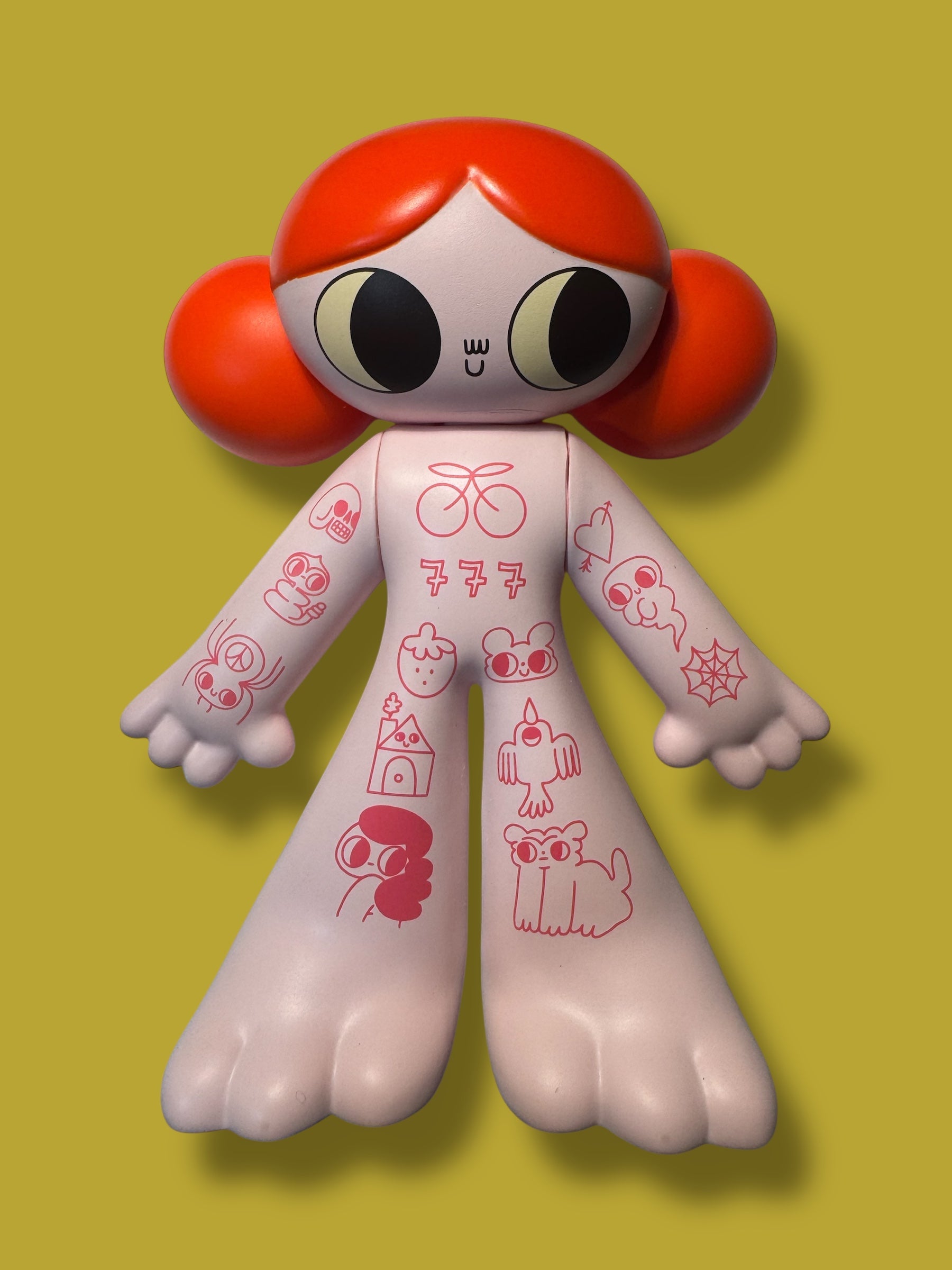 Tattoo Girl - Sailor by Burger Babie, a 5 vinyl art toy with red pigtails and tattoo-style icons, limited to 100 pieces.